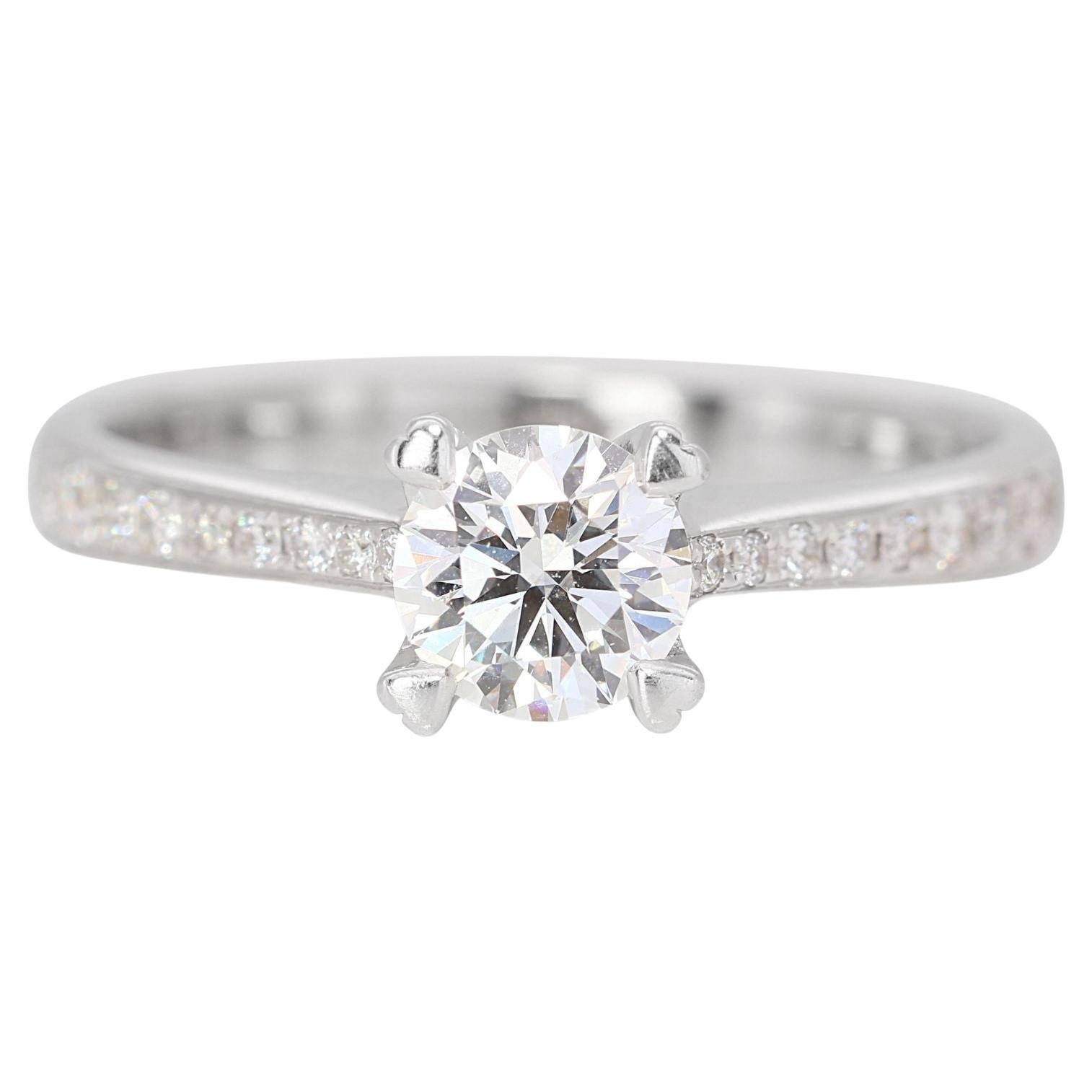 Bague en or blanc 18 carats avec diamants latéraux de 0,20 carat en vente