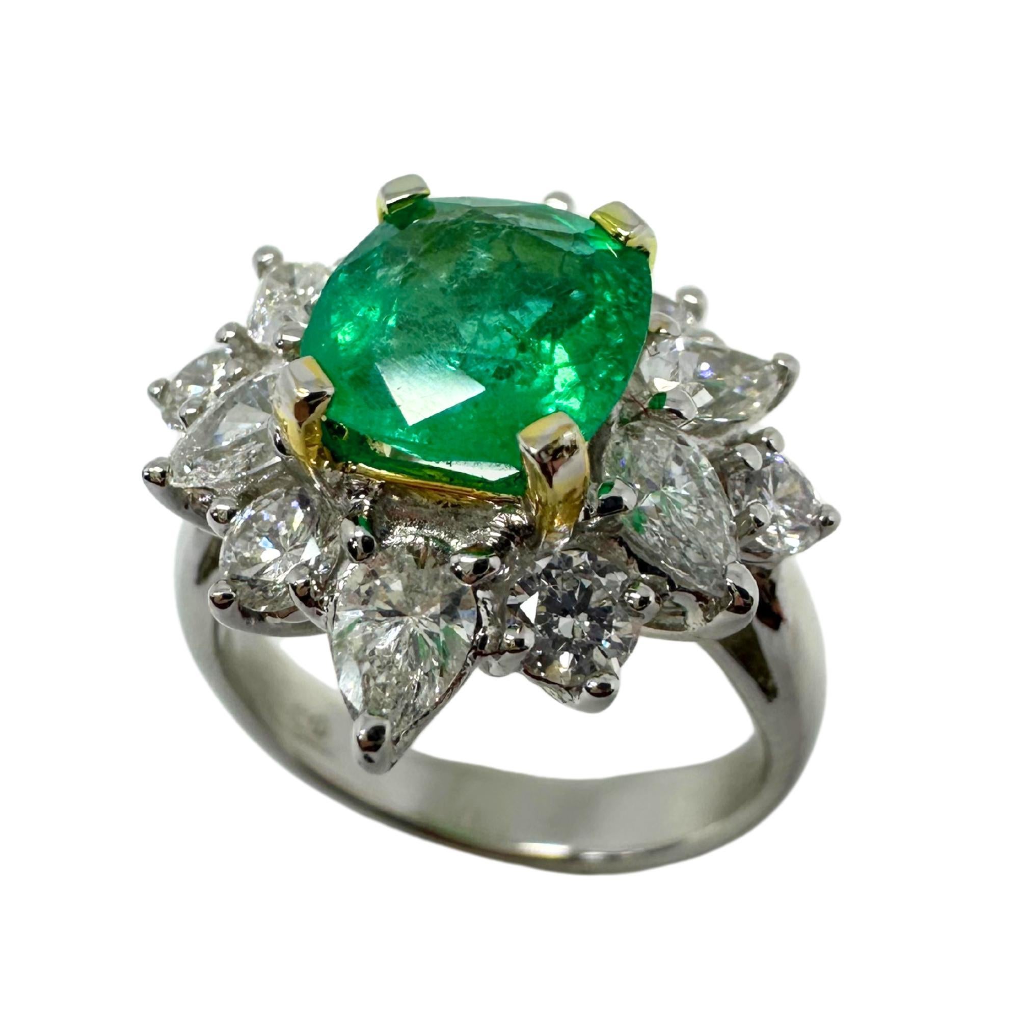 Women's 18K White Gold Pear Cut Diamond and Emerald Ring For Sale