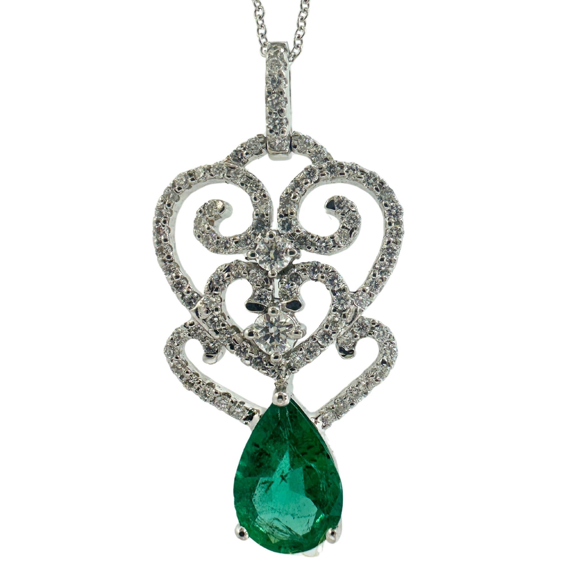 18K White Gold Pear Cut Emerald and Diamond Pendant Necklace
Condition: In good condition with some minor surface wear consistent with age.
Length: 18 inch chain, 1.25 inch pendant
Markings: 