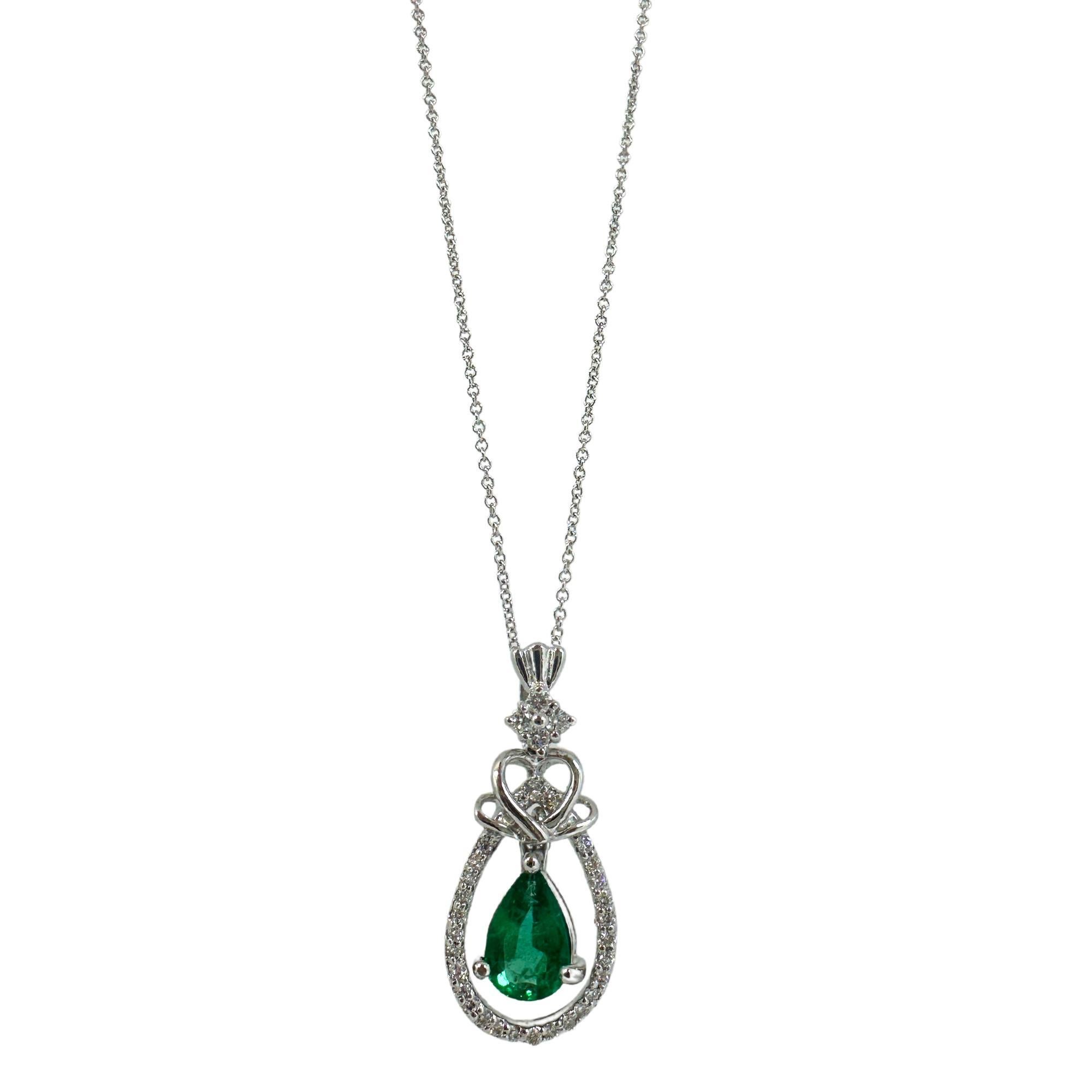 18K White Gold Pear Cut Emerald and Diamond Pendant Necklace
Condition: In good condition with some minor surface wear consistent with age.
Length: 16 inch chain, 0.75 inch pendant
Markings: 