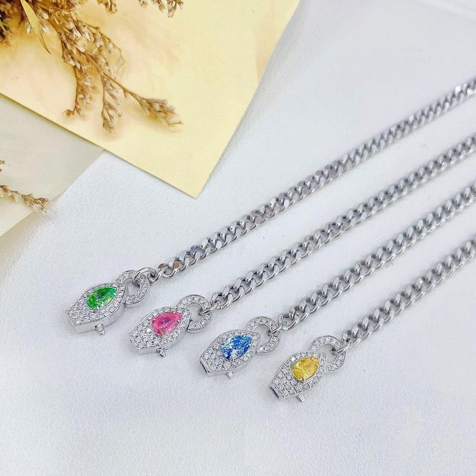 Modern 18K White Gold Pear-Cut Fancy Blue Diamond Cuban Chain Diamond Bracelet For Sale