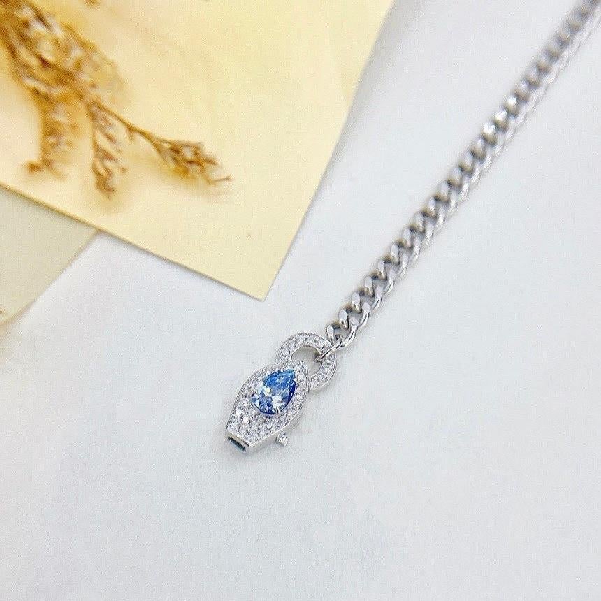 Pear Cut 18K White Gold Pear-Cut Fancy Blue Diamond Cuban Chain Diamond Bracelet For Sale