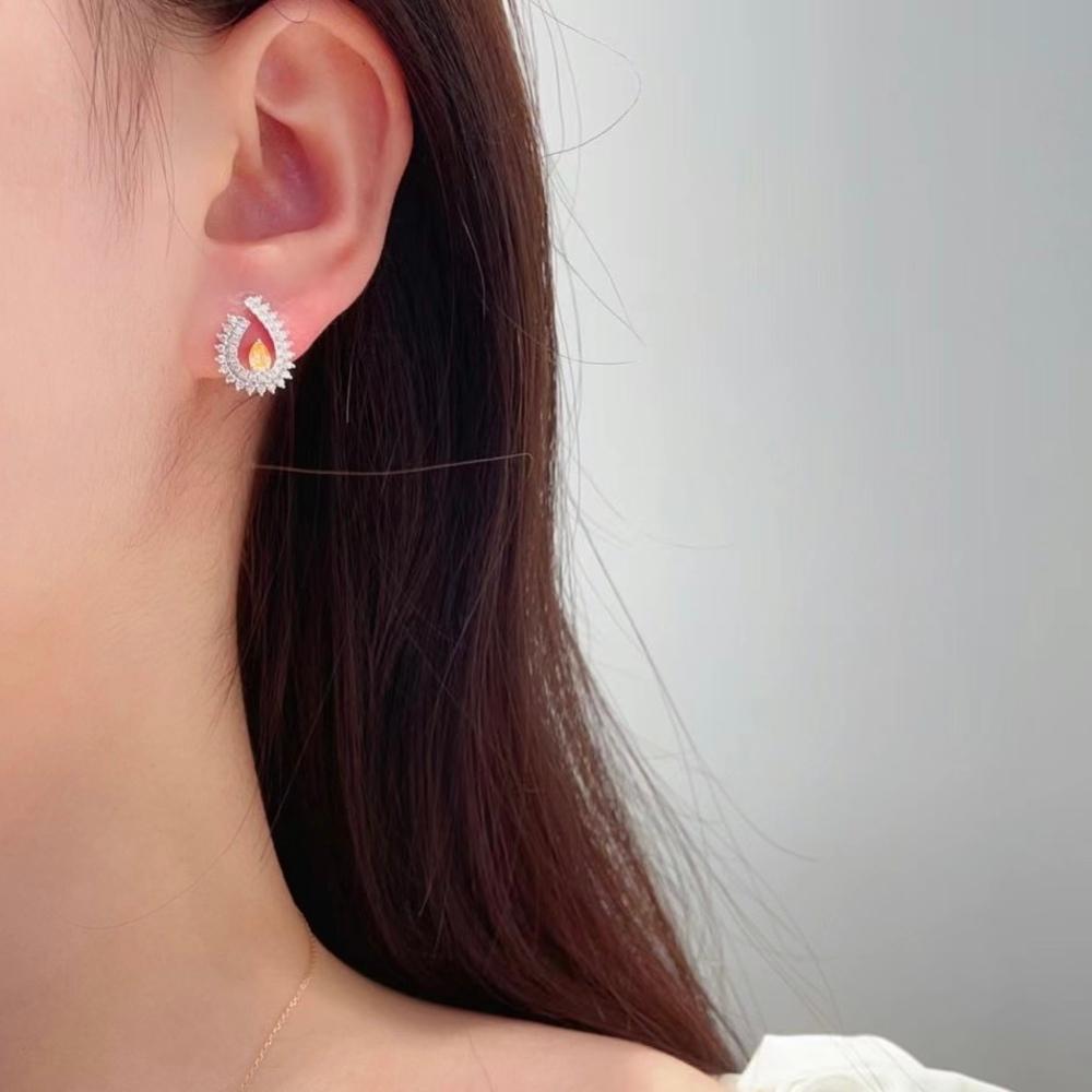 Modern 18K White Gold Pear-Cut Fancy Yellow Diamond & Diamond Stud Earrings For Sale