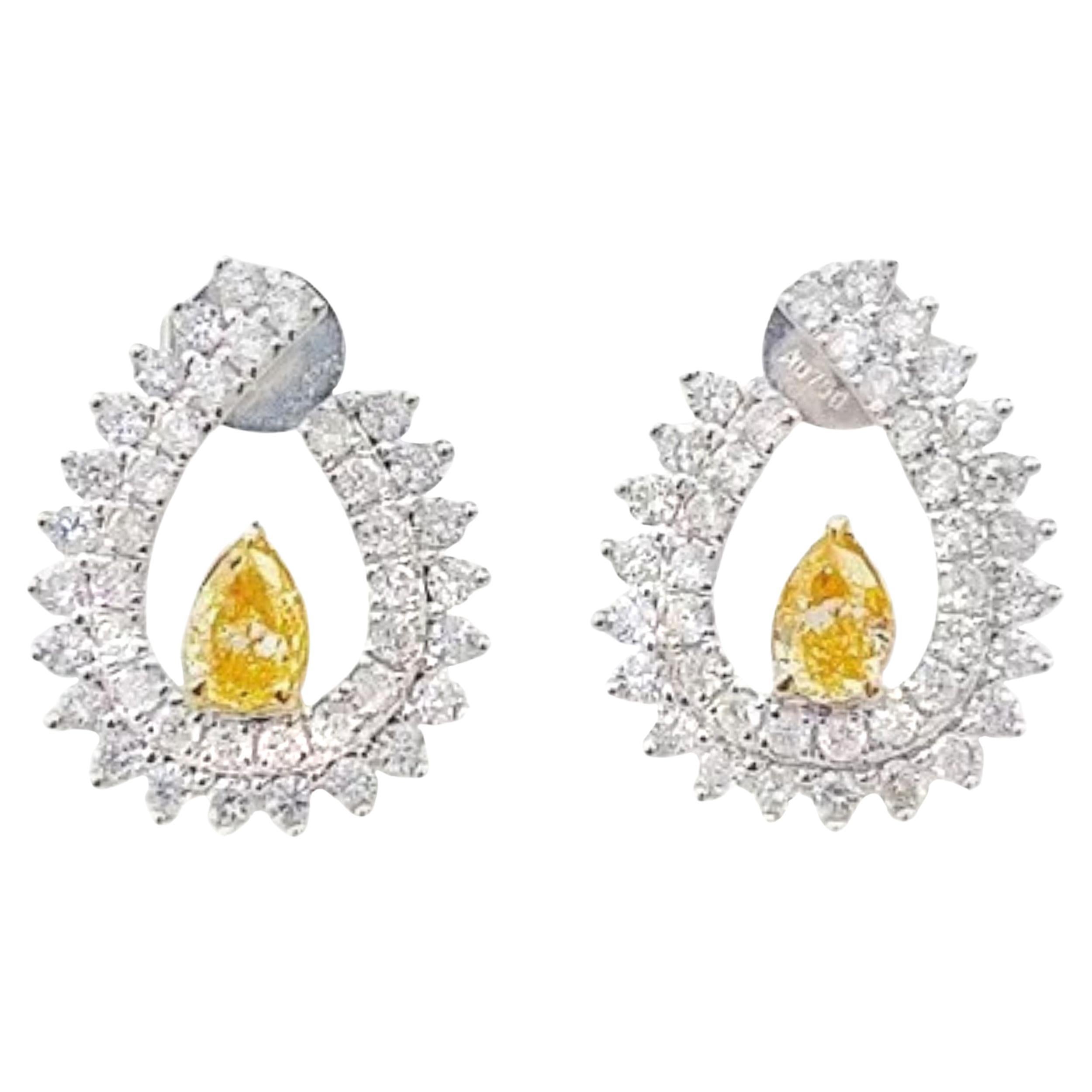 Pendientes de oro blanco de 18 quilates con diamante amarillo fantasía talla pera y diamantes