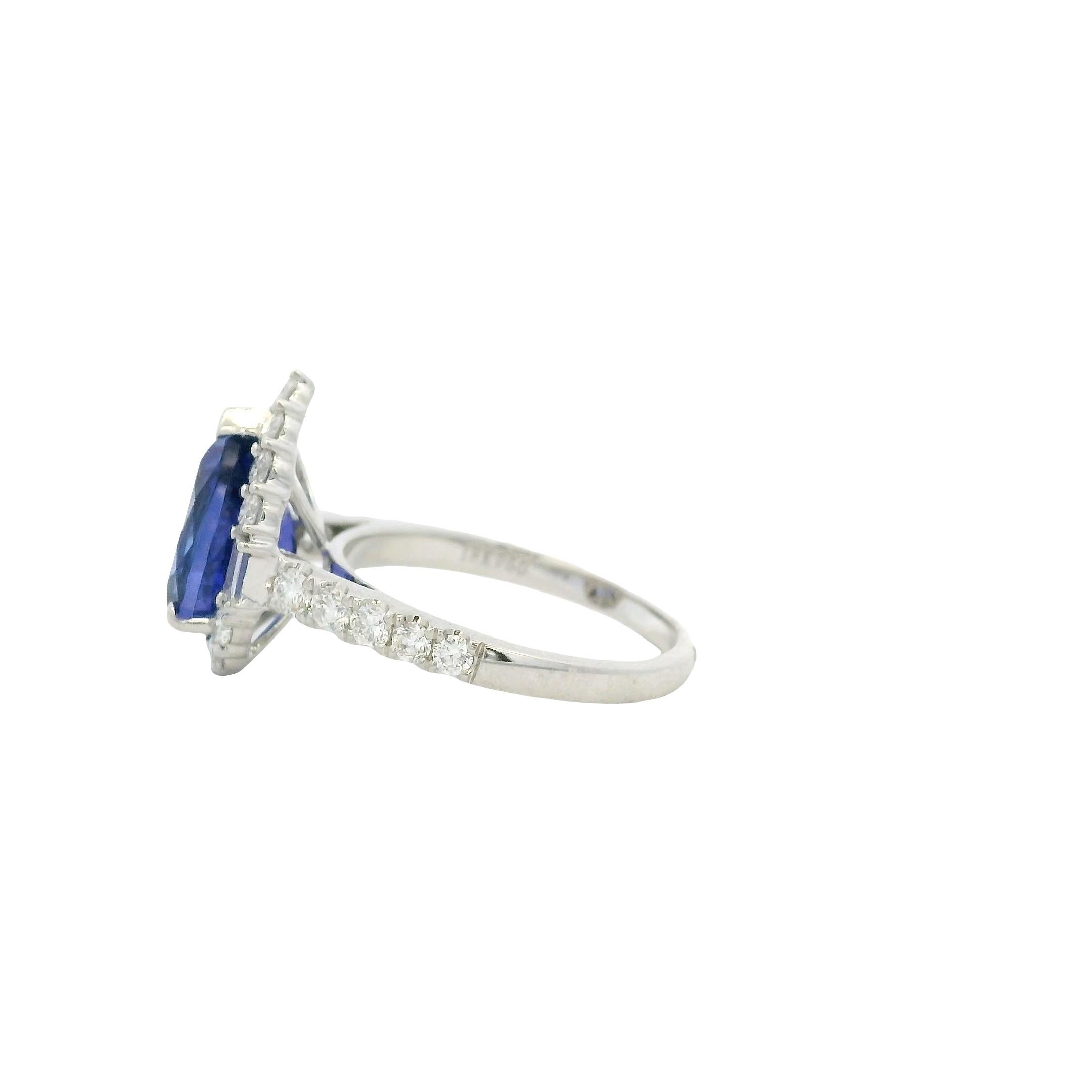 18k Weißgold Tansanit im Birnenschliff und Baguette und runder Diamant Verlobungsring (Moderne) im Angebot