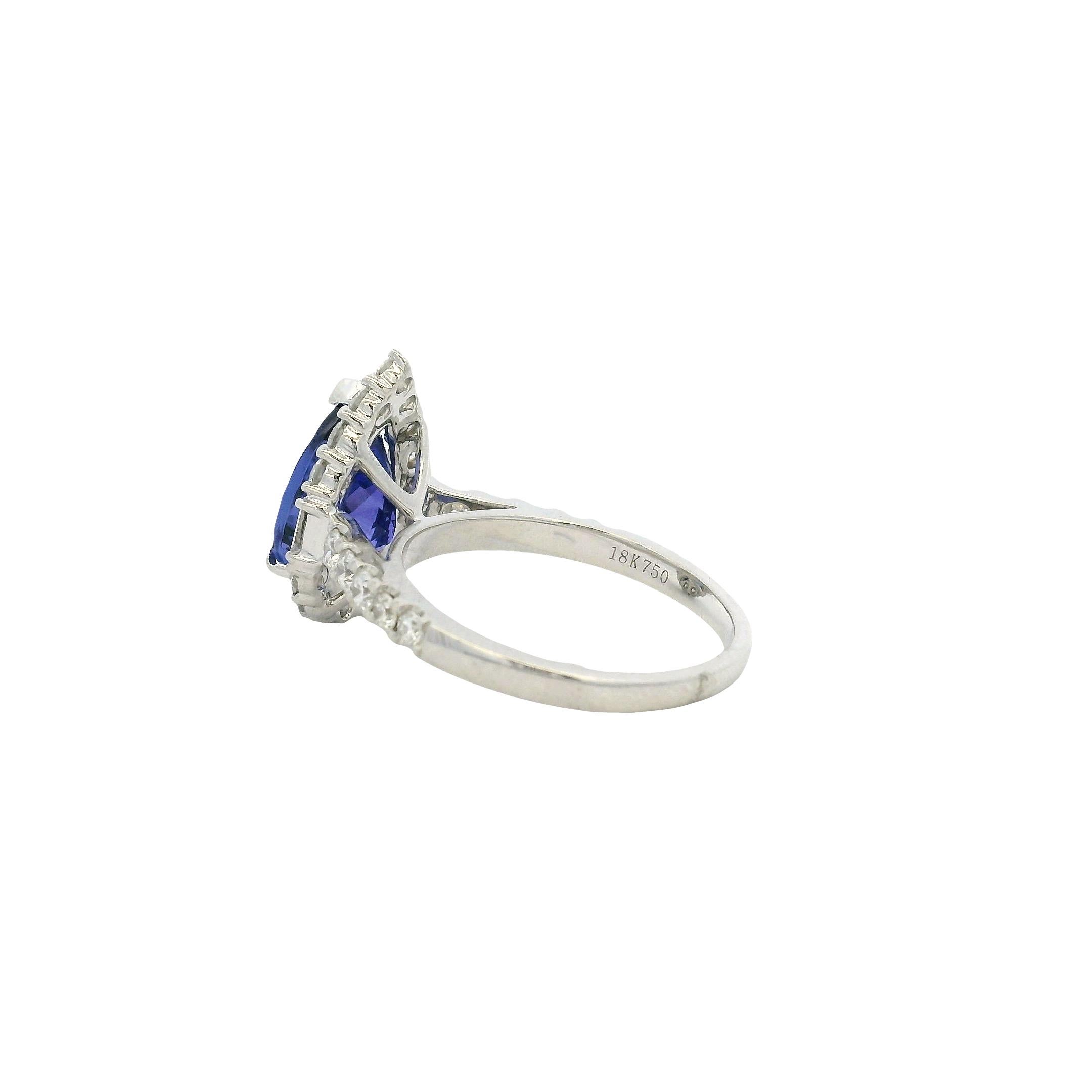18k Weißgold Tansanit im Birnenschliff und Baguette und runder Diamant Verlobungsring im Angebot 3