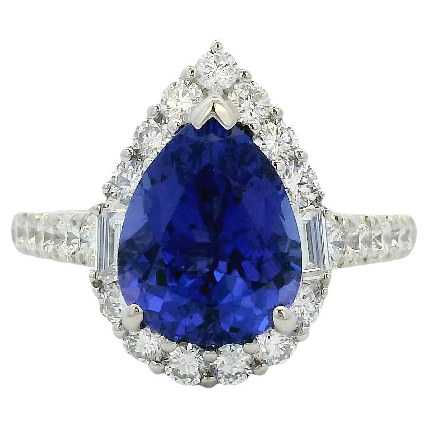 18k Weißgold Tansanit im Birnenschliff und Baguette und runder Diamant Verlobungsring