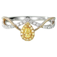 Bague en or blanc 18 carats diamant jaune taille poire et diamant