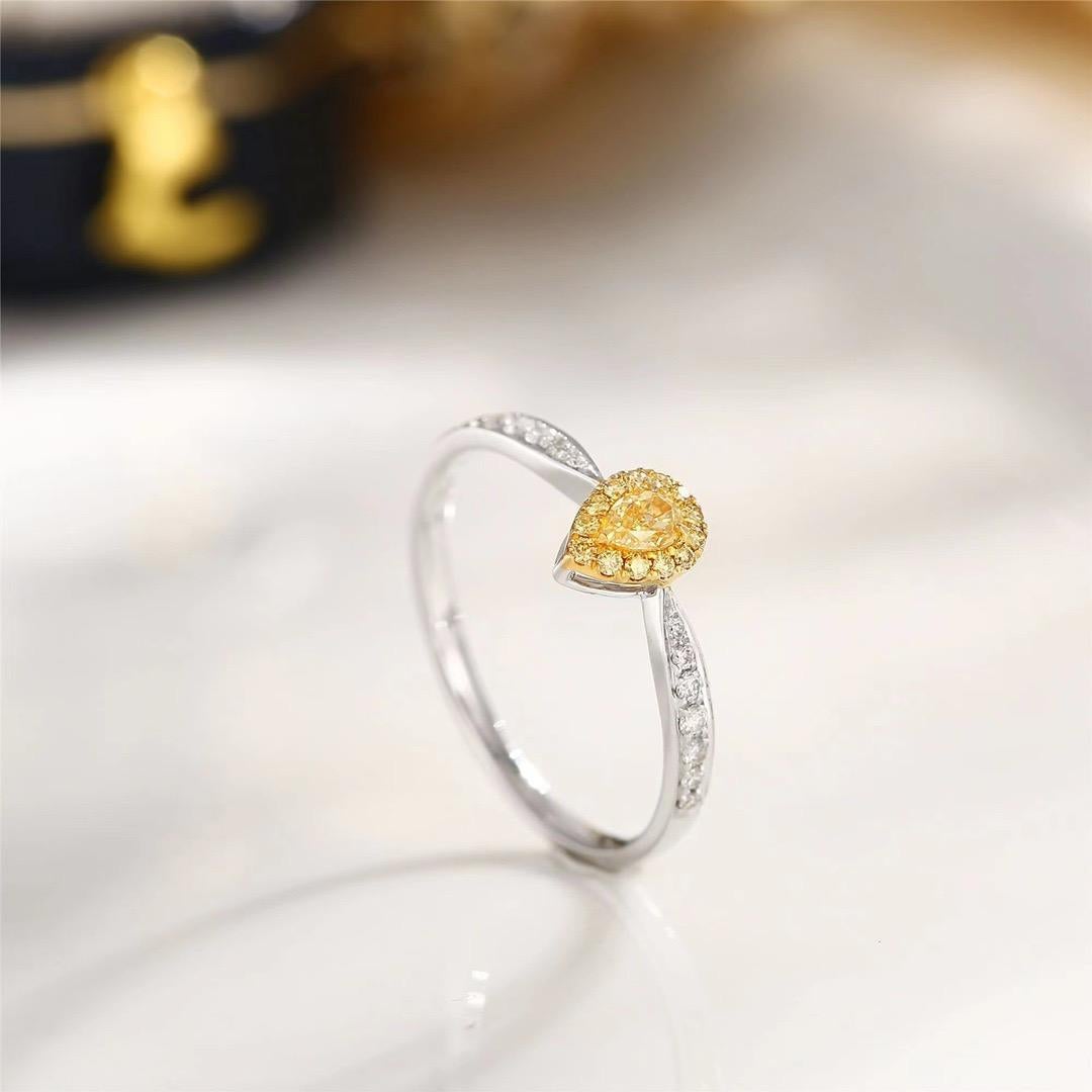18K White Gold Pear-Cut Yellow Diamond Ring with Diamonds

1 Pear-Cut Yellow Diamond - 0.12 CT
Diamonds - 0.13 CT
Total Weight - 1.51 GM