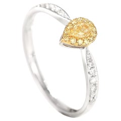 Bague en or blanc 18 carats avec diamants jaunes taille poire
