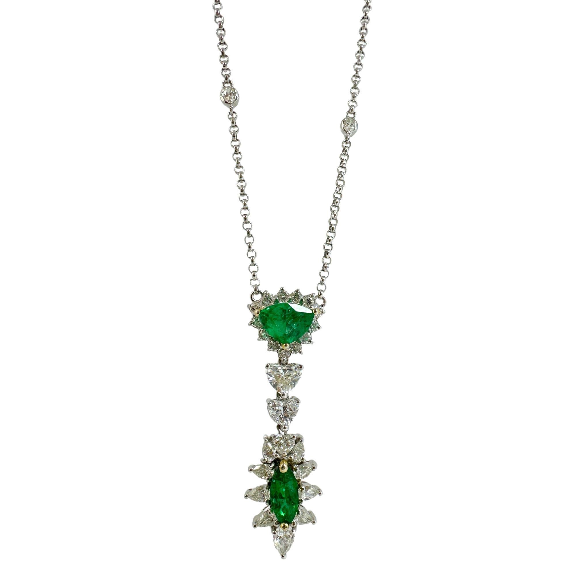 18k White Gold Pear, Heart Cut Diamond and Marquise, Trillion Cut Emerald Necklace
Condition: In good condition with some minor surface wear consistent with age.
Length: 16 inch chain, 1.5 inch pendant
Markings: 