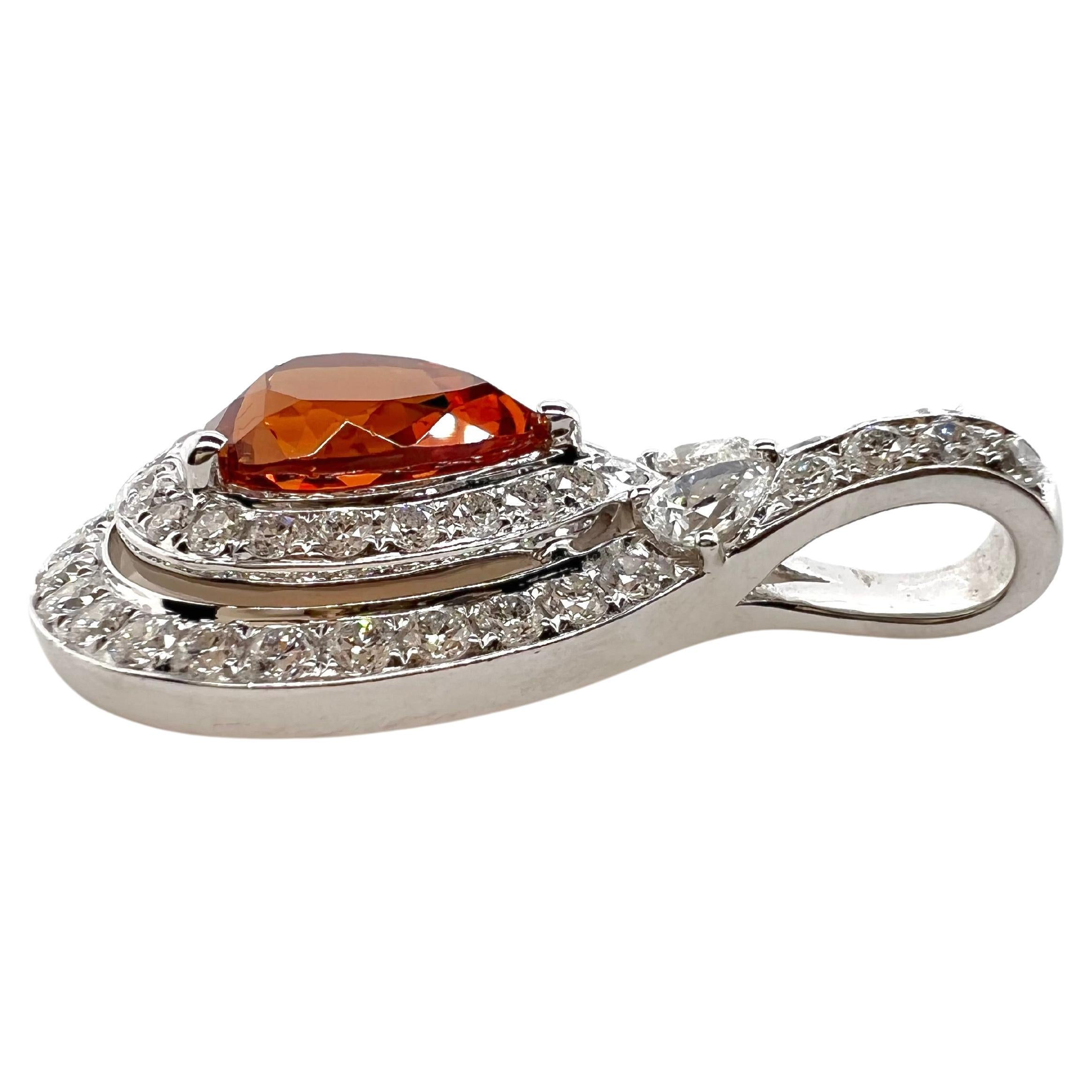 Absolutely gorgeous!  The pear shaped mandarin garnet has so much fire and is contrasted by the bright diamonds on the setting in the 18k white mounting.  The pear shape design truly accentuates the beautiful garnet!.


Stone: Mandarin Garnet 3.55