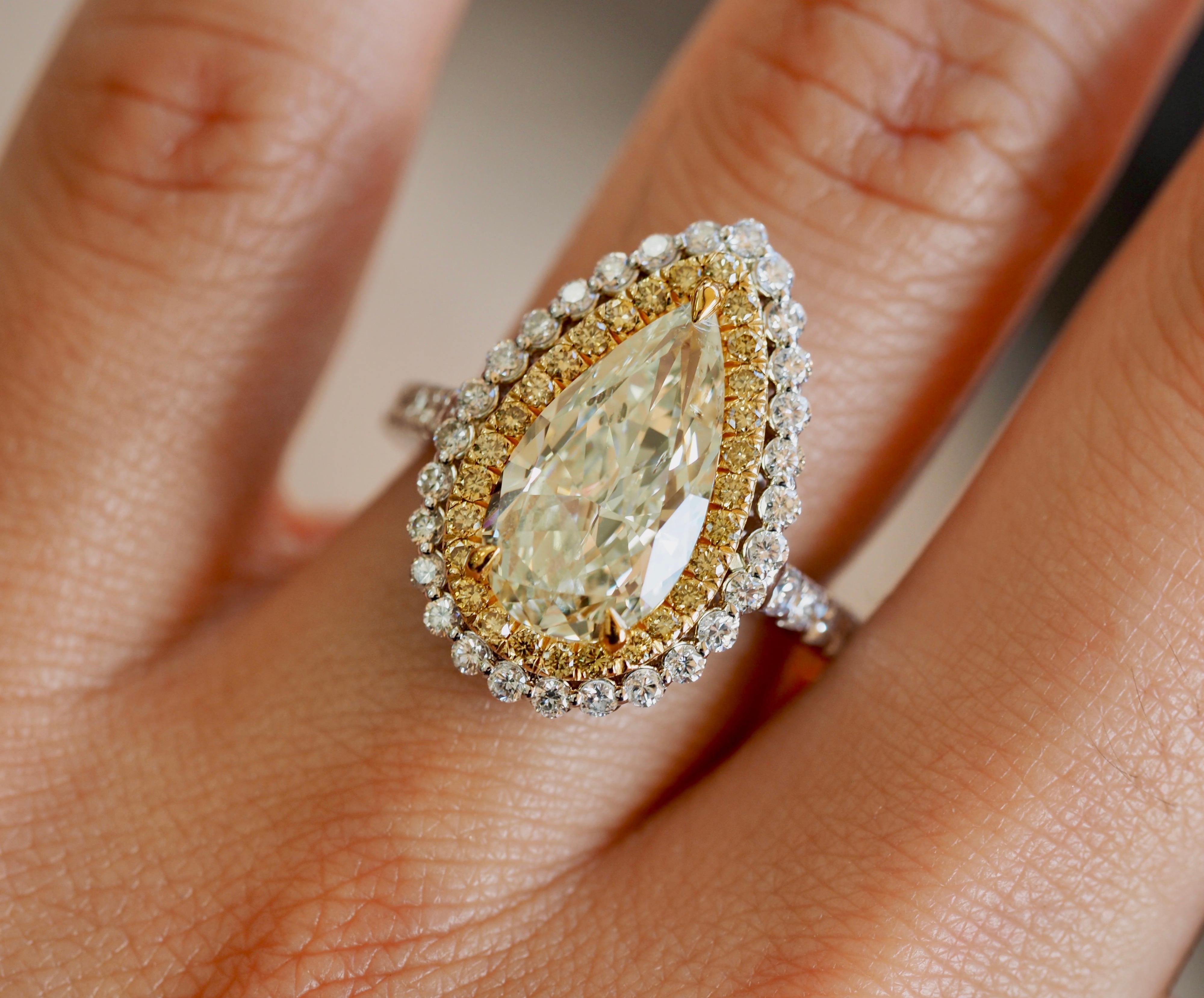 Contemporary 18 Karat White Gold Pear Shape Yellow Diamond Double Halo Engagement Ring