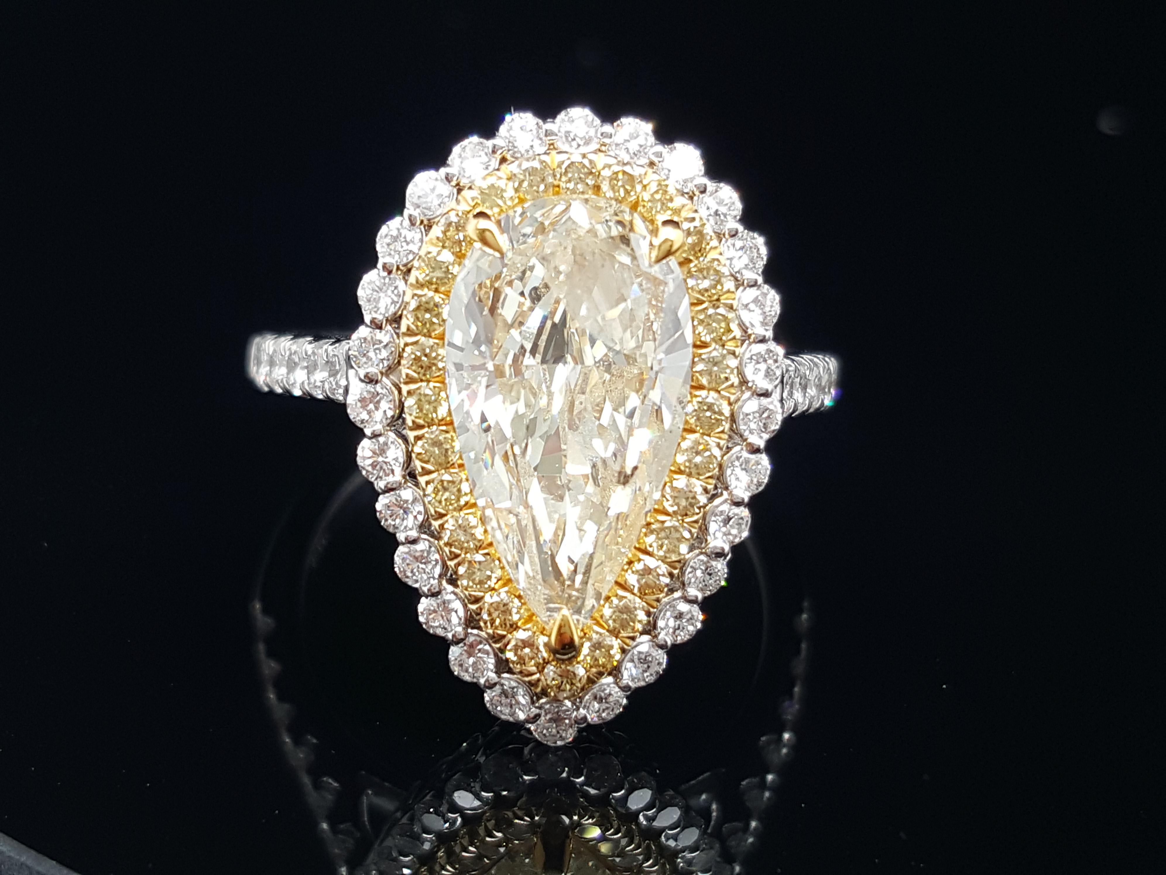 18 Karat White Gold Pear Shape Yellow Diamond Double Halo Engagement Ring In New Condition In Addison, TX