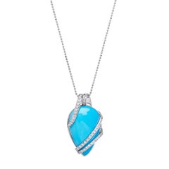18k white gold pear shaped turquoise and diamond set pendent