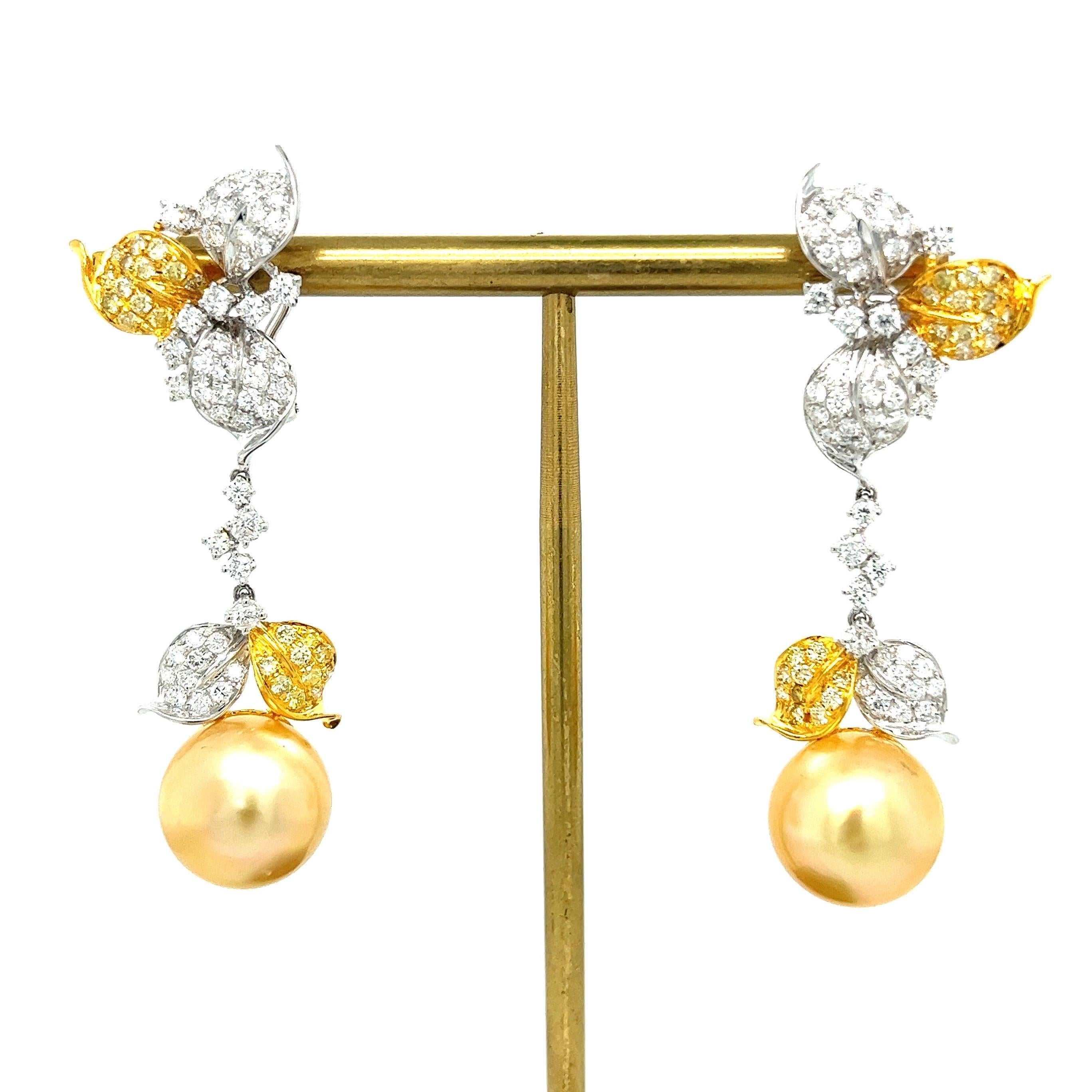 18K White Gold Pearl & Diamond Drop Earrings

2 Pearls - 13MM
142 Diamonds - 3.10 CT
18K White Gold - 12.37 GM

The Althoff Jewelry 18K white gold earrings feature flawless golden pearls, reminiscent of pure gold, complemented by petal-shaped
