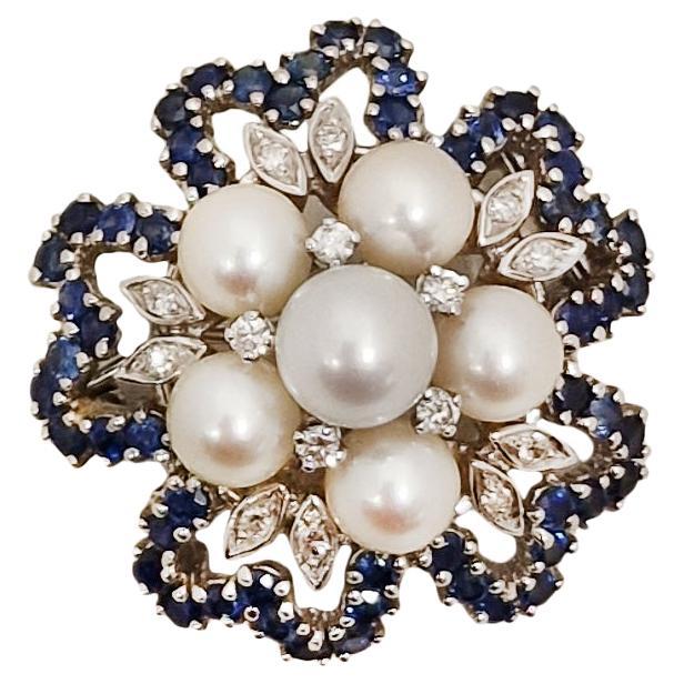 18k White Gold, Pearls Diamonds and Blue Sapphires Brooch