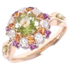 18K White Gold Peridot Diamond Ring in Aurora Style Stone Setting