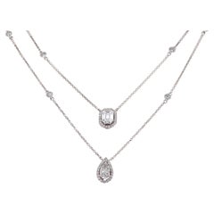 Collier en or blanc 18 carats, poire taillée et diamant naturel serti en émeraude