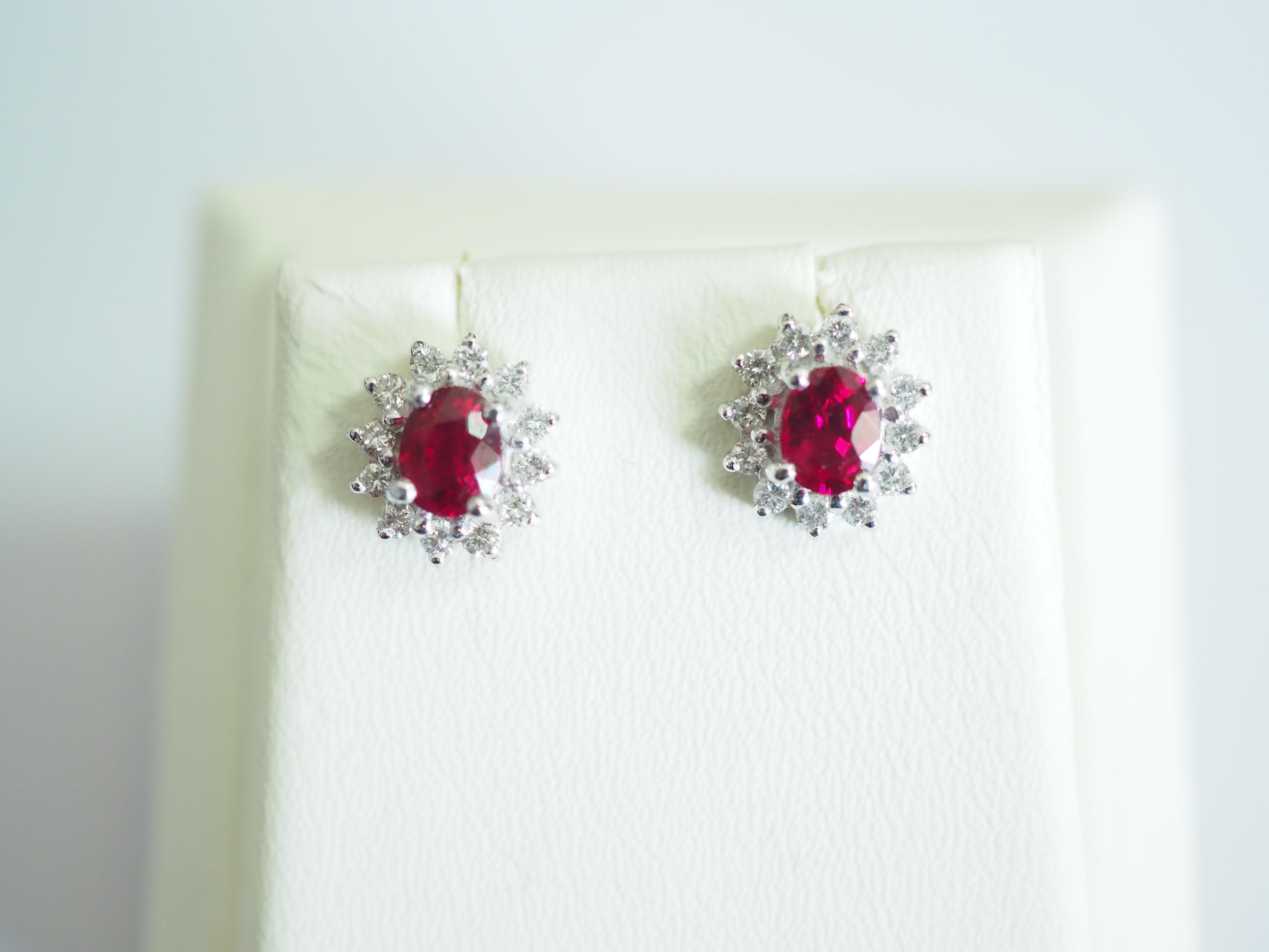 Presented here is a fine gorgeous ruby and diamond cocktail stud earrings. The oval rubies have the color of pigeon's blood which very rare and most sought-after color for rubies. The diamonds are genuine with good color and clarity, very clean. The