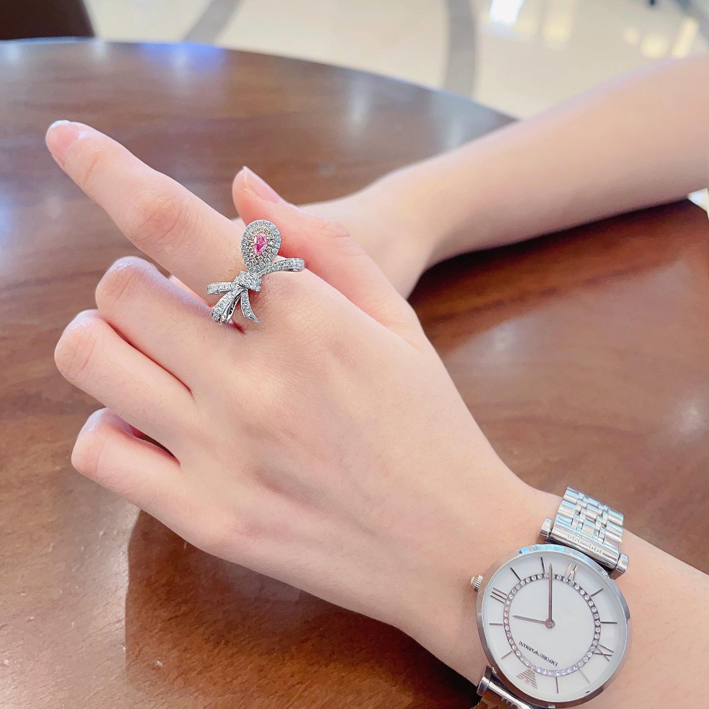 Pear Cut 18K White Gold Pink Diamond Bow Ring with Diamonds For Sale