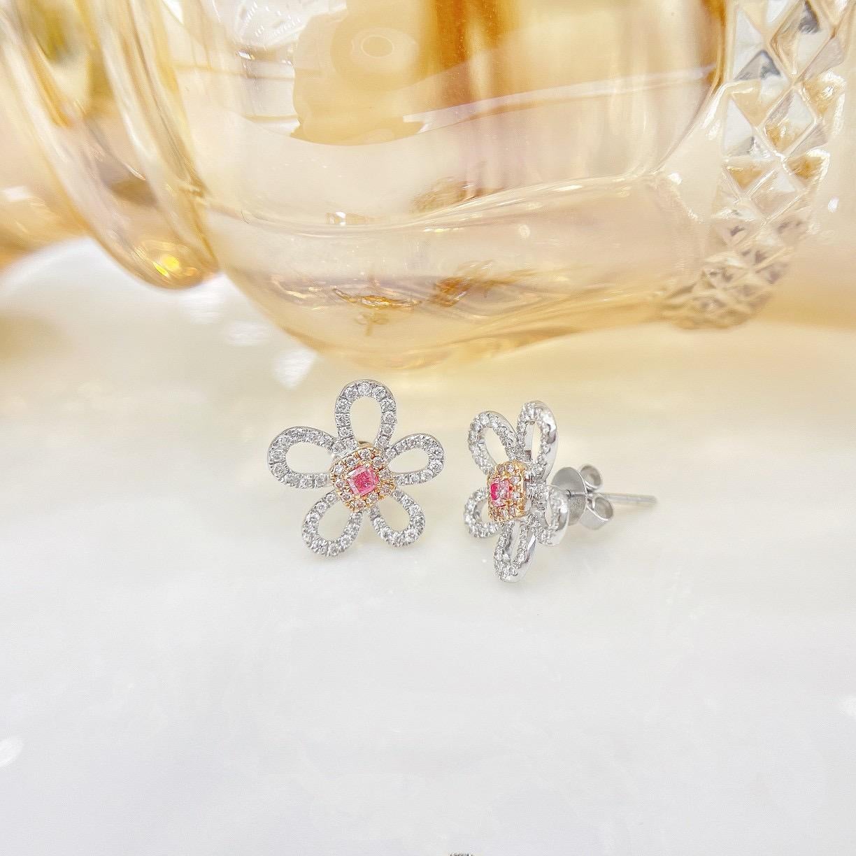 Pendientes Flor Diamante Rosa Oro Blanco 18K

2 Diamantes Rosas - 0.12 CT
Diamantes - 0.40 CT

Peso total - 2,70 GM
