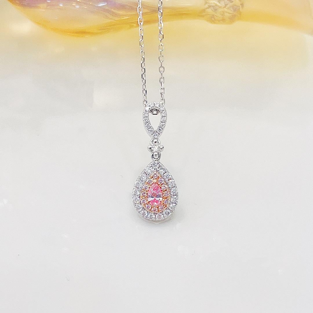 18K White Gold Pink Diamond Pendant Necklace

Pink Diamond - 0.08 CT
Diamonds - 0.22 CT
Total Weight - 2.15 GM