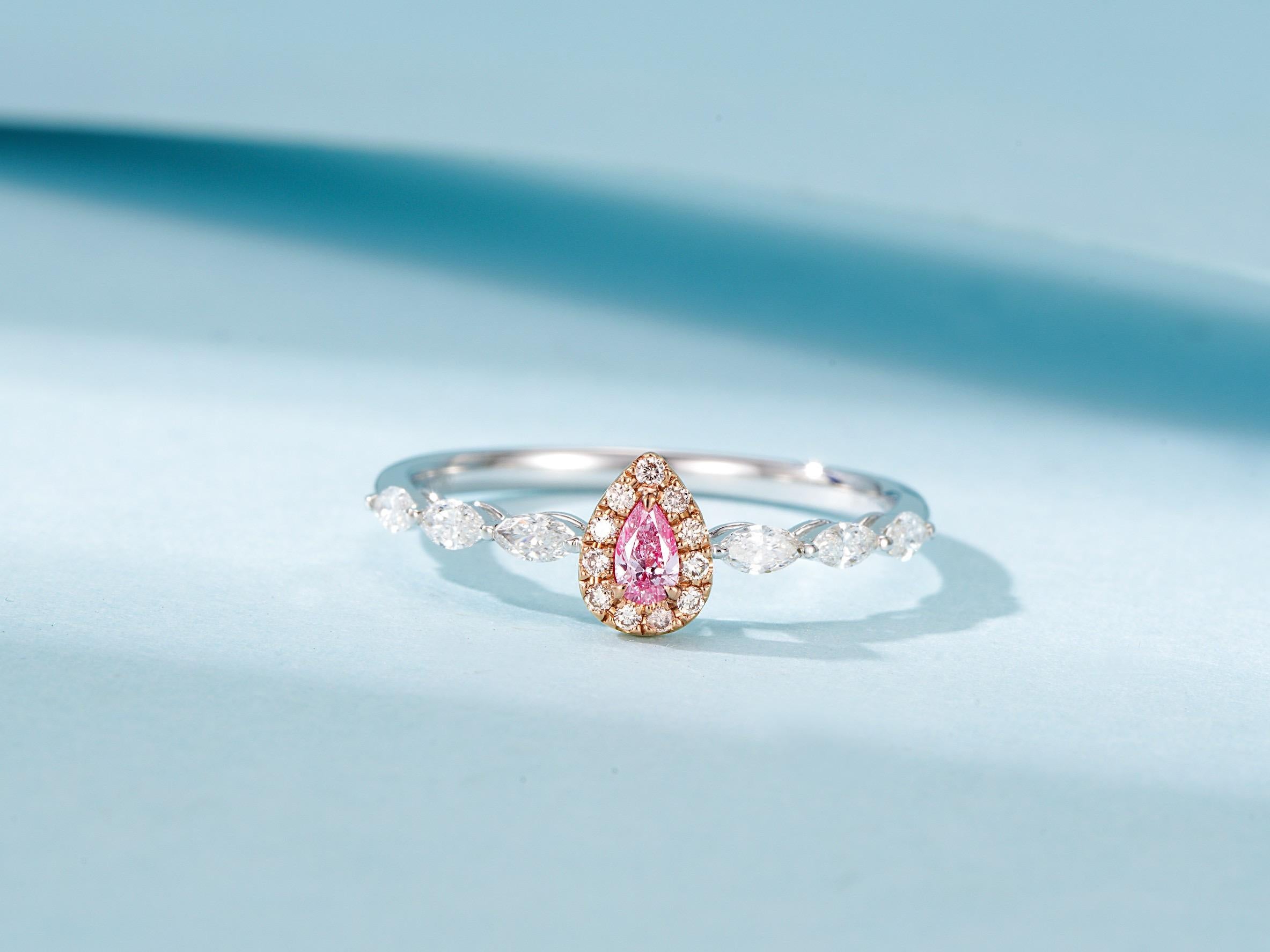 18K White Gold Pink Diamond Ring

1 Pink Diamond - 0.08 CT
Diamonds - 0.27 CT

Total Weight - 1.37 GM