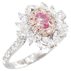 Bague en or blanc 18 carats avec diamants roses