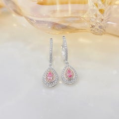 Orecchini a goccia con diamante rosa in oro bianco 18K
