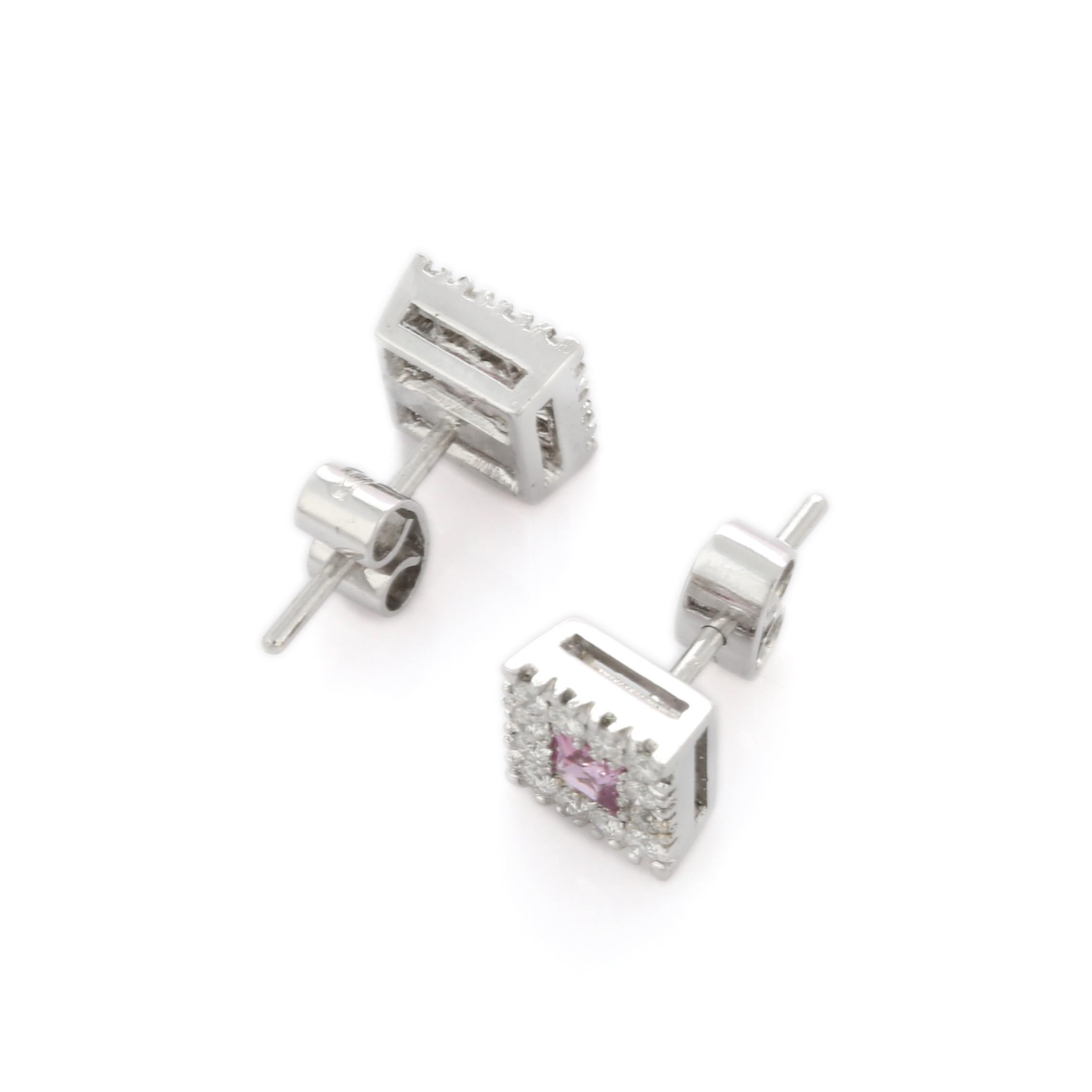 Studs create a subtle beauty while showcasing the colors of the natural precious gemstones and illuminating diamonds making a statement.

Square cut pink sapphire studs with diamonds in 18K gold. Embrace your look with these stunning pair of
