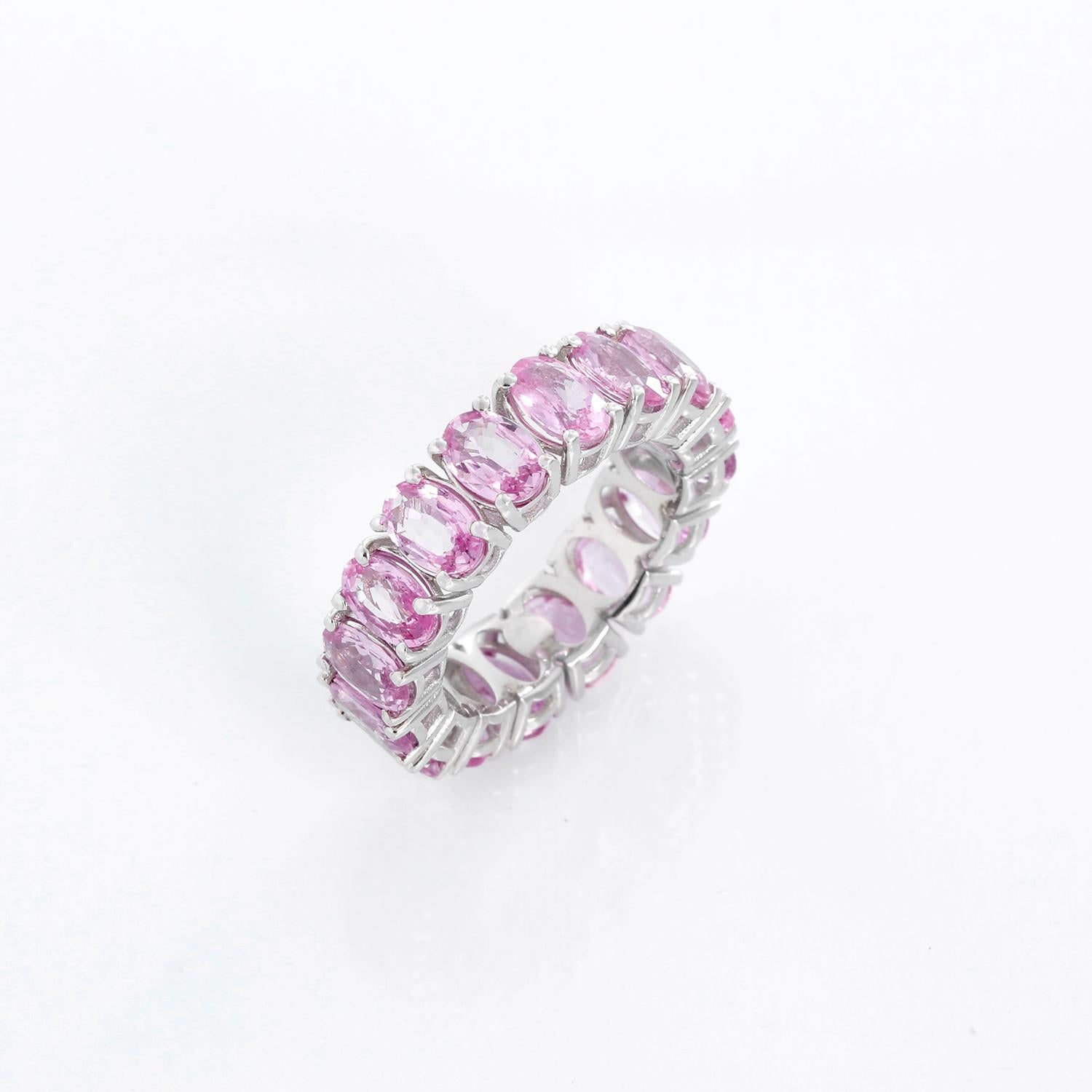 18K White Gold Pink Sapphire Eternity Band Size 7 - Truly stunning eternity band with oval pink sapphires equaling 8.81 cts.  Total weight 6.5 grams. Size 7. Radiant wedding band, perfect for that special person in your life.