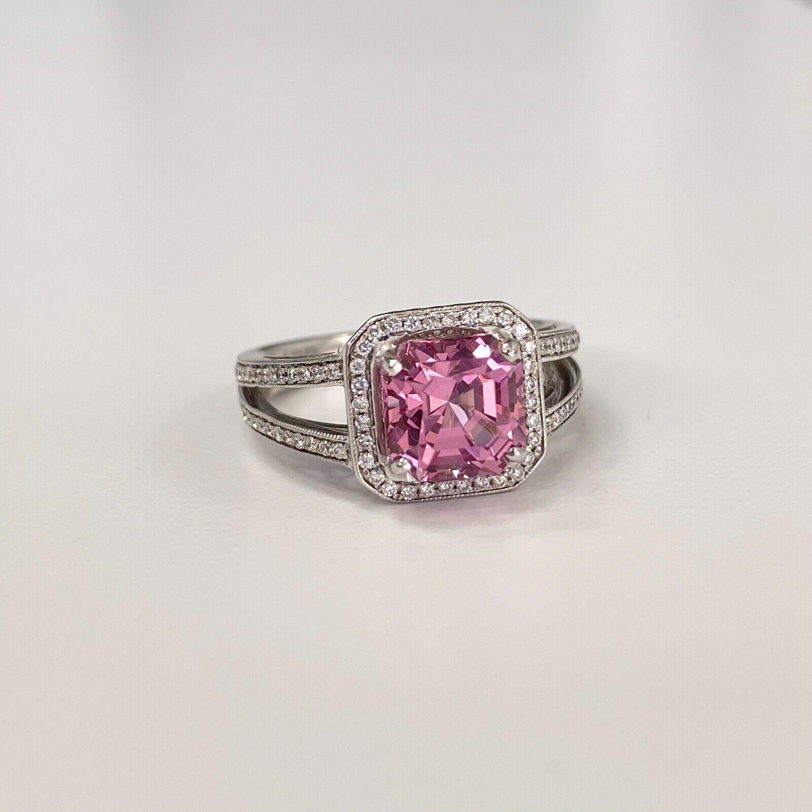 Specifications:
    main stone:2.48 CARAT PINK SPINEL
    DIAMONDS:HI SI
    DIAMONDS carat total weight:APPROX. 0.50 CARAT TOTAL WEIGHT
    color:GH
    clarity:VS2-SI1
    brand:-  metal:18K GOLD
    type: ring
    weight:4.7GrS
    size:5.75
