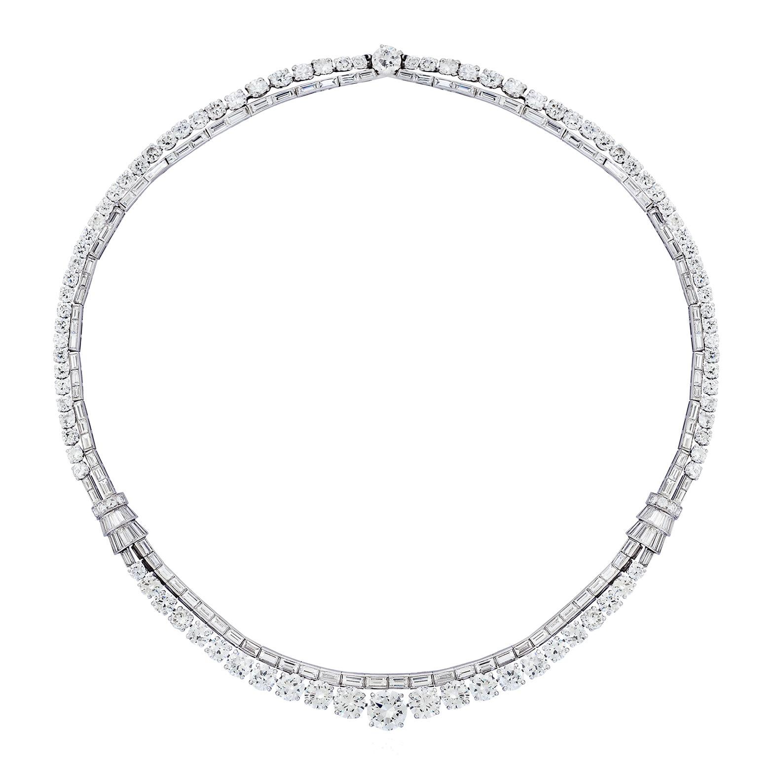 Platinum and 18-karat white gold necklace with baguette- and brilliant-cut diamonds. Weight of the central diamond: approx. 2.50 cts. Length: 39 cm. Grand weight: 65.59g.