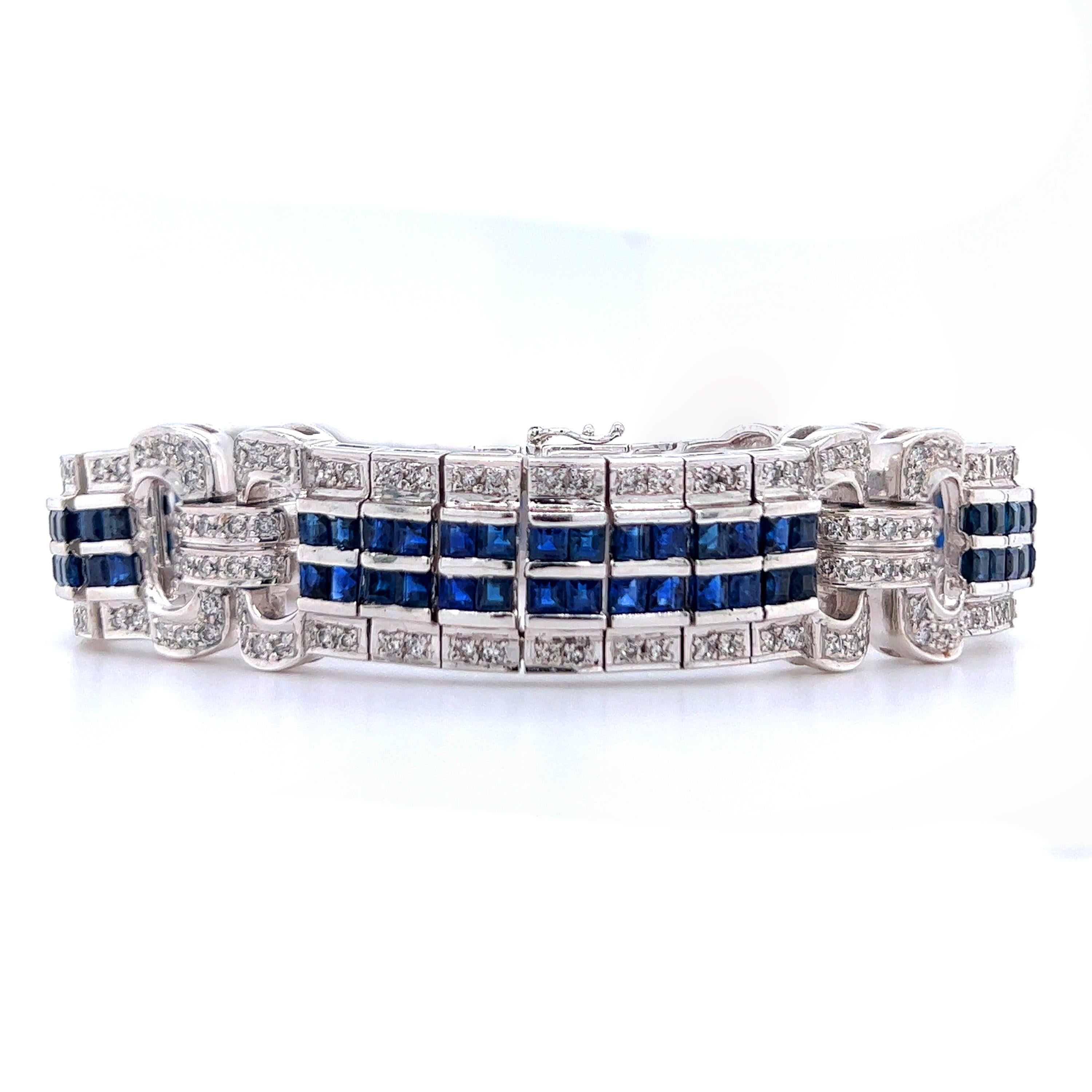 18K White Gold Princess Cut Blue Sapphire Diamond Bracelet

Apprx. 2.40ct. G-H color, SI clarity diamonds total weight
Apprx. 5.80ct. Princess cut Blue Sapphires

7 inches in length. 14mm width.