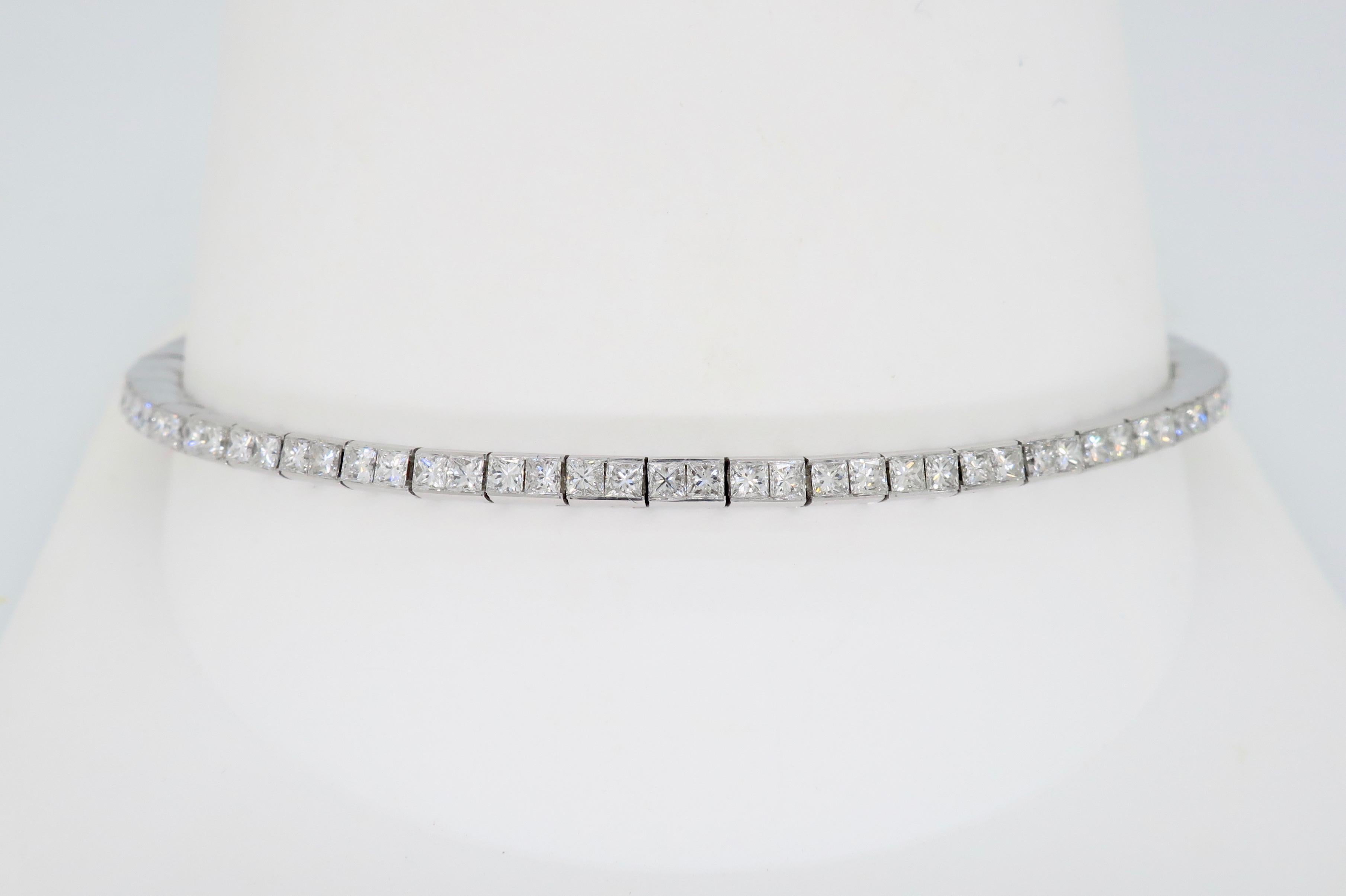 Classic Princess Cut diamond line bracelet crafted in 18k white gold.

Diamond Carat Weight: Approximately 3.73CTW
Diamond Cut: Princess Cut 
Color: Average G-I
Clarity: Average VS2-SI2
Metal: 18K White Gold
Marked/Tested: Stamped  “3.73