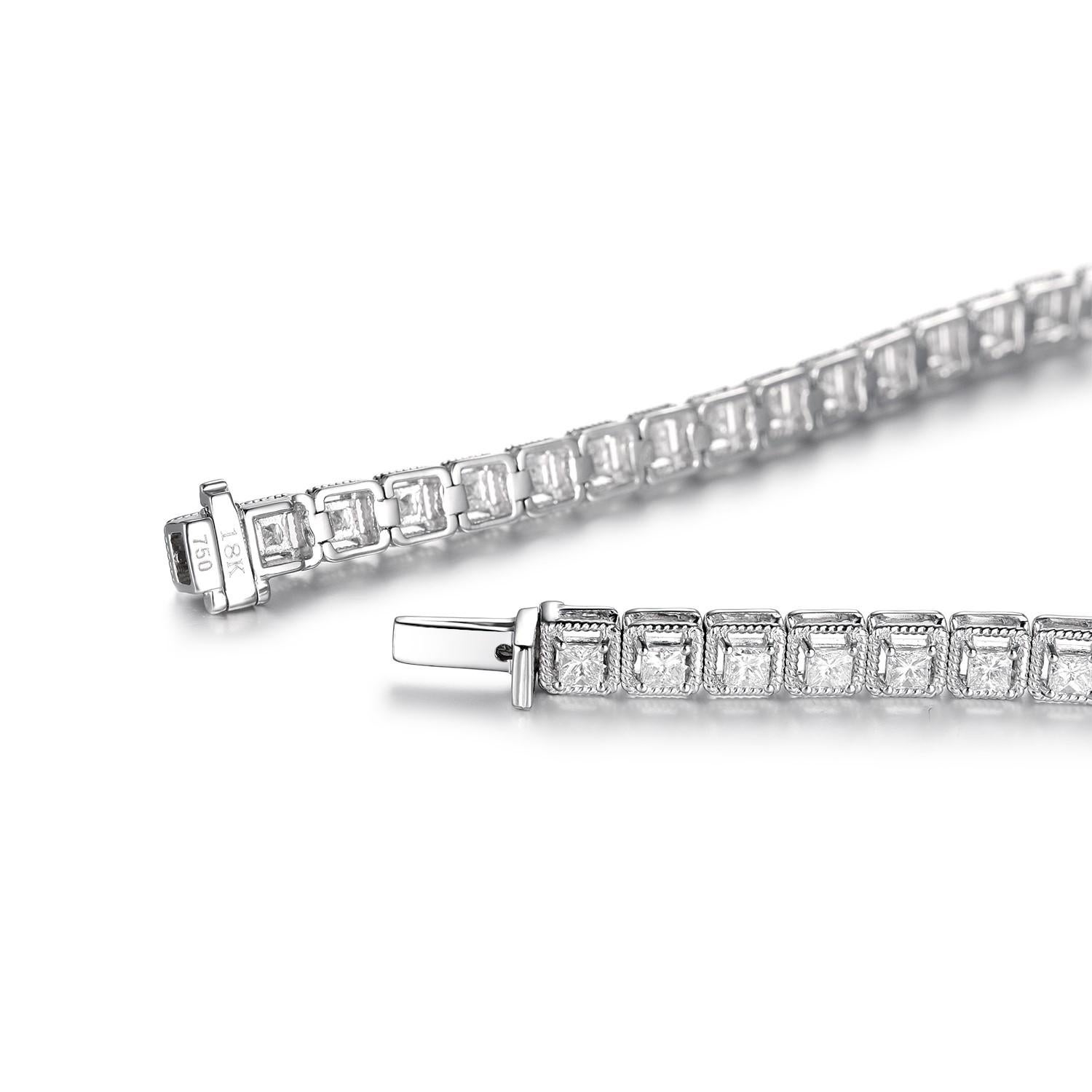 Dieses Tennisarmband besteht aus 2,14 Karat Diamanten im Prinzessinnenschliff. Die Diamanten sind in 18 Karat Gold gefasst. Der Rand des Armbands ist mit einer gedrehten Perlenfassung versehen.

Diamant im Prinzessinnenschliff 2,14 Karat
F-G Farbe