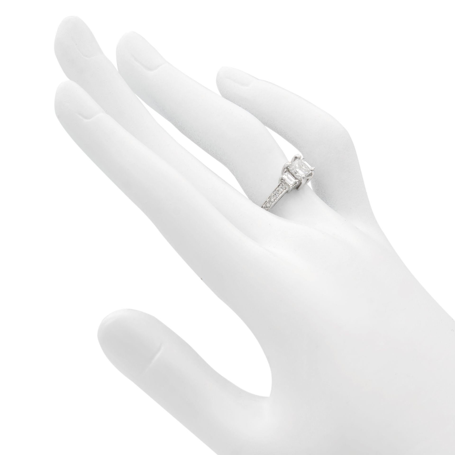 Women's or Men's 18 Karat White Gold Princess and Emerald Cut Three-Stone Ring 1.36 Carat For Sale