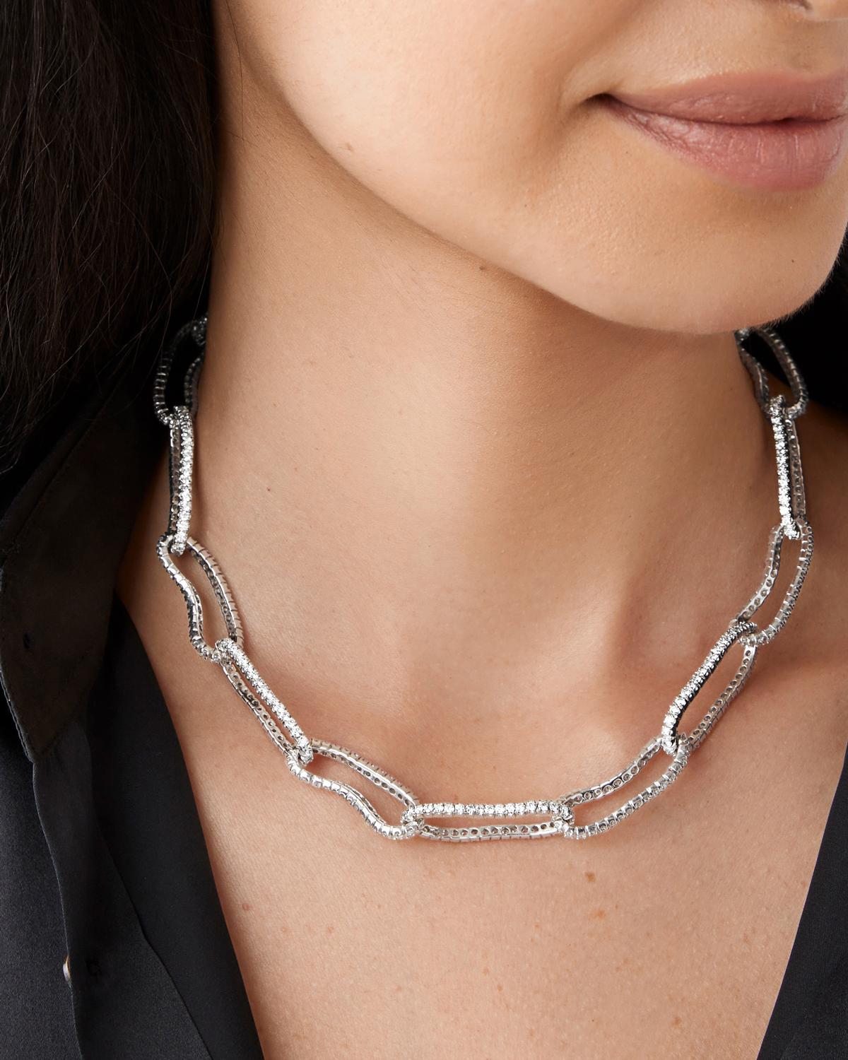 Crushed Link Necklace is made from 18k White Gold with VS white diamonds set along crushed links. Features 16 in custom link closure as pictured.

Width: 13mm

Please note the possibility of natural inclusions in gemstones

Made in the USA