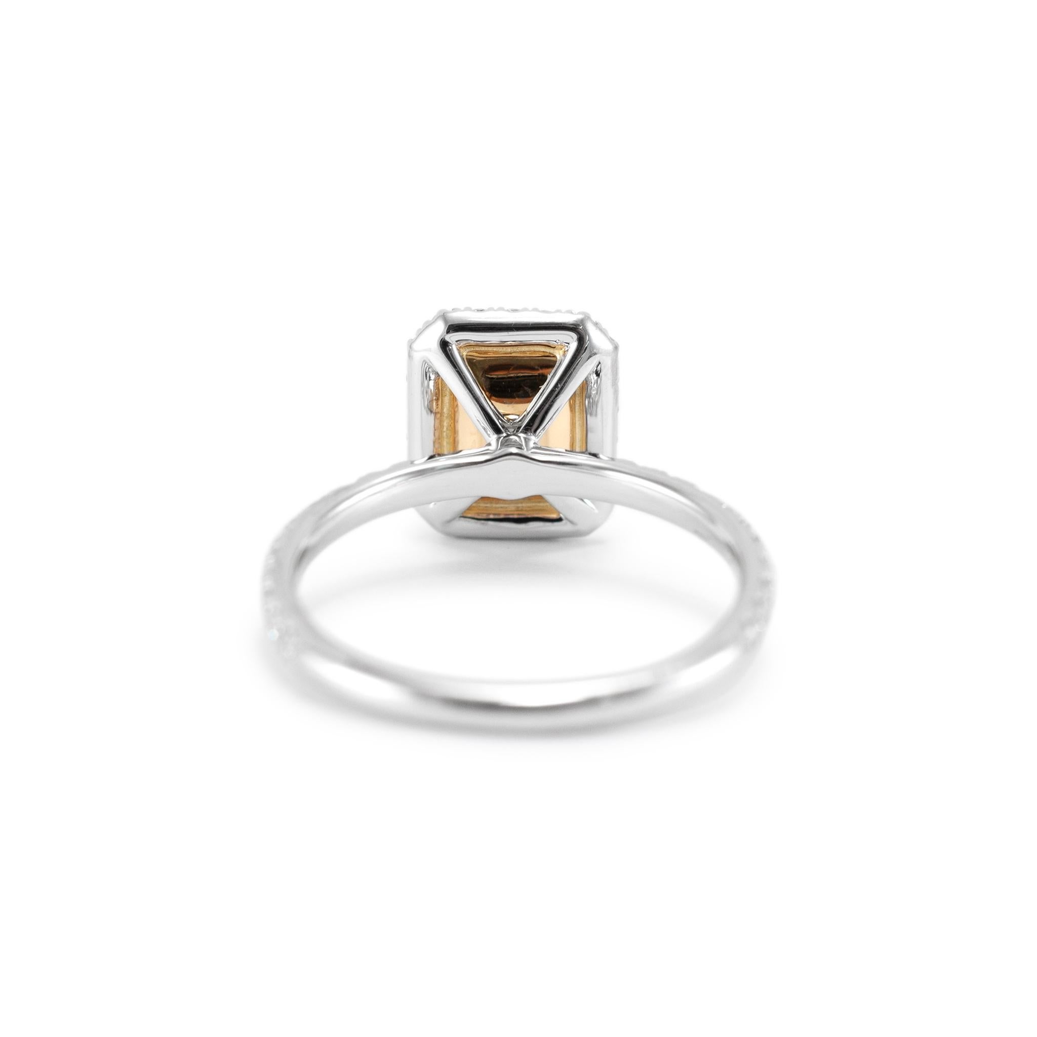Women's 18K White Gold Radiant Cut GIA Fancy Yellow Diamond Halo White Engagement Ring For Sale
