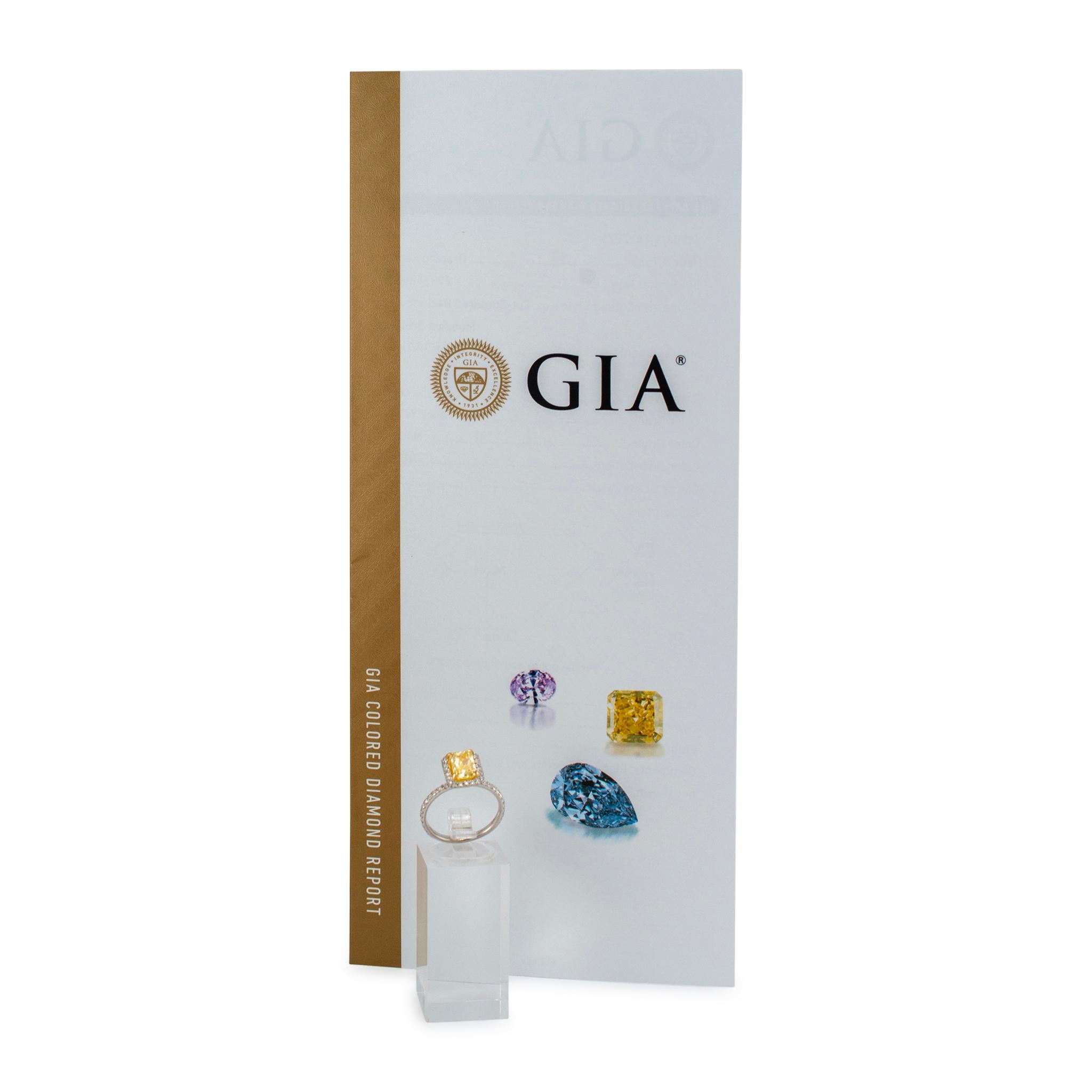 18K White Gold Radiant Cut GIA Fancy Yellow Diamond Halo White Engagement Ring For Sale 3