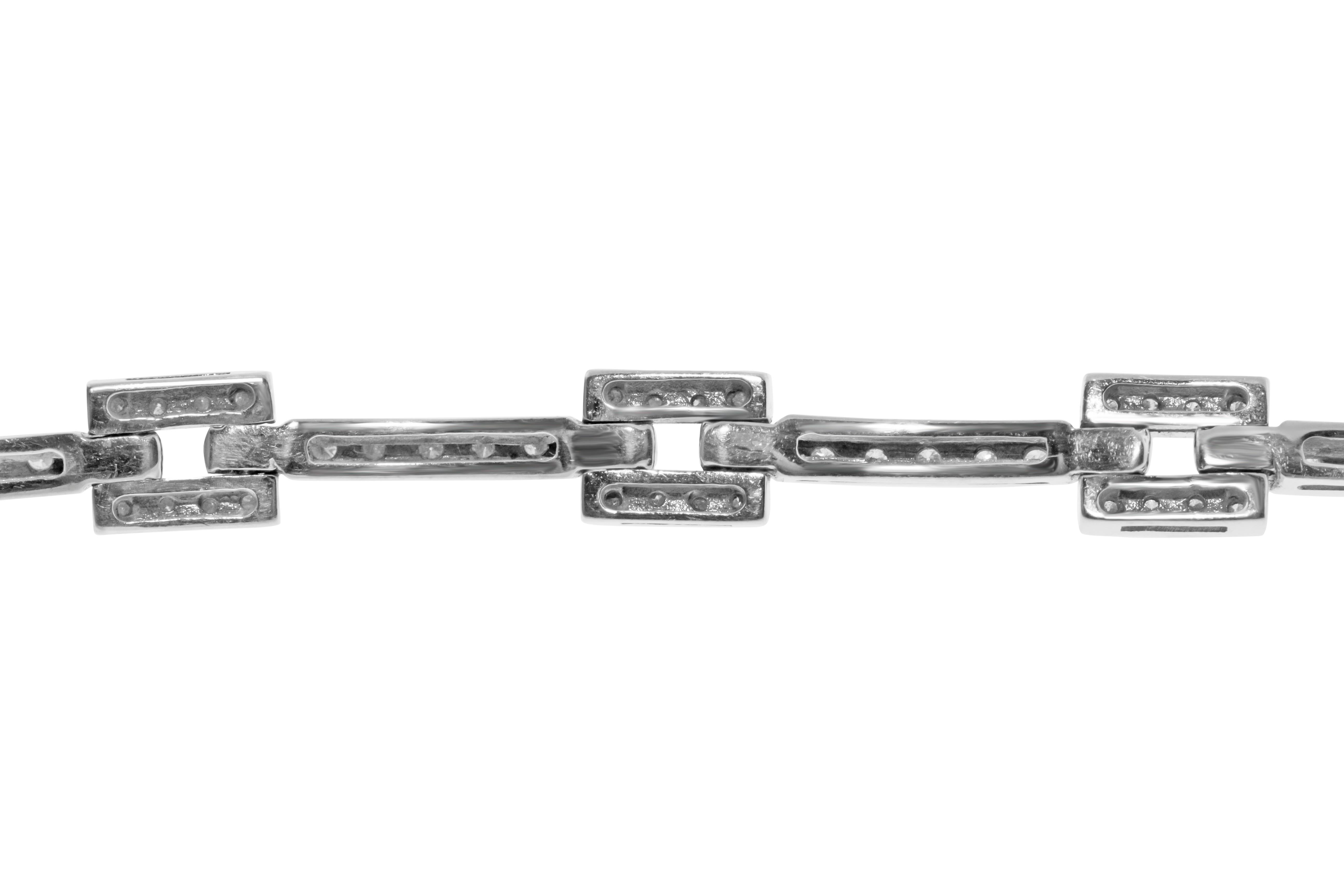 Rectangular link diamond bracelet featuring 130 round G-H VS diamonds set in 14.5 grams of white gold. Made in Italy. 7.5 inch length.

Can be sized down upon request. 

Viewings available in our NYC showroom by appointment.
