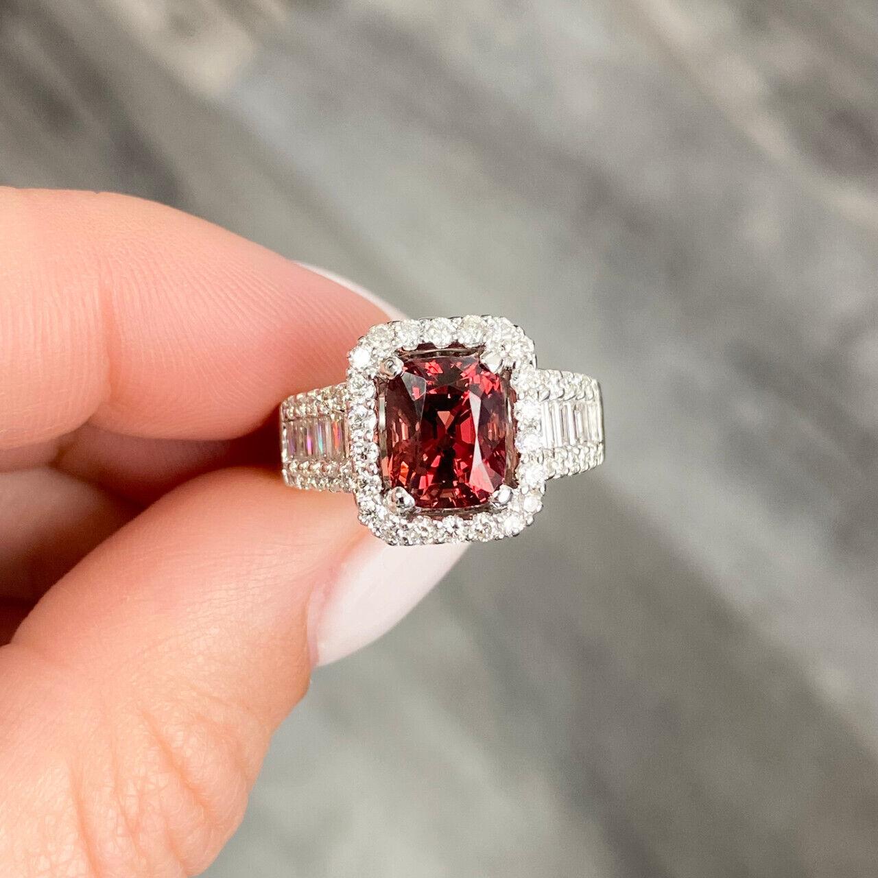 Specifications:
Pre-Owned (Great condition)
Metal: 18K White Gold
Weight: 8gr
Main Stone: 3.07ct Spinel red with brown undertone
Side Stones: Diamonds
Diamond Carat Total Weight: Approximately 1.23ctw
Color: G
Clarity: SI
Size: 6.5US





