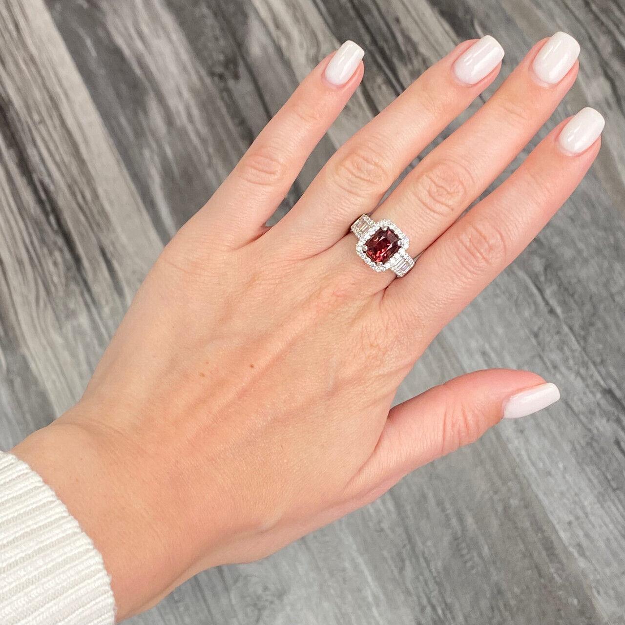 Contemporary 18k White Gold Red Spinel Halo and Baguette Ring For Sale