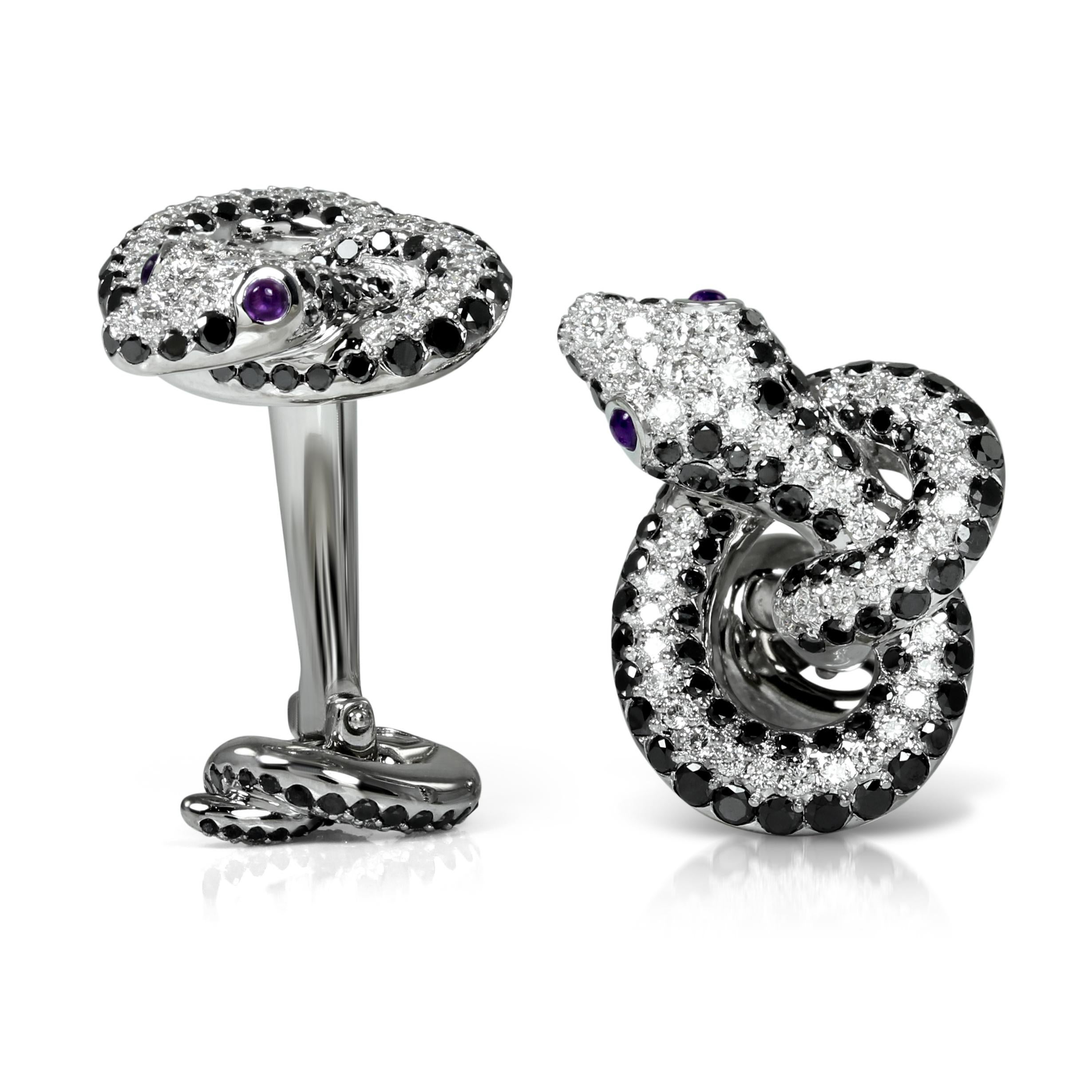 These studs a from the AENEA Sarpa Signature are one of a kind and matching to the cufflinks for special occasions! Handcrafted in 18k White Gold with White & Black Diamonds and Amethysts these are an amazing gift. Matching Cufflinks are available