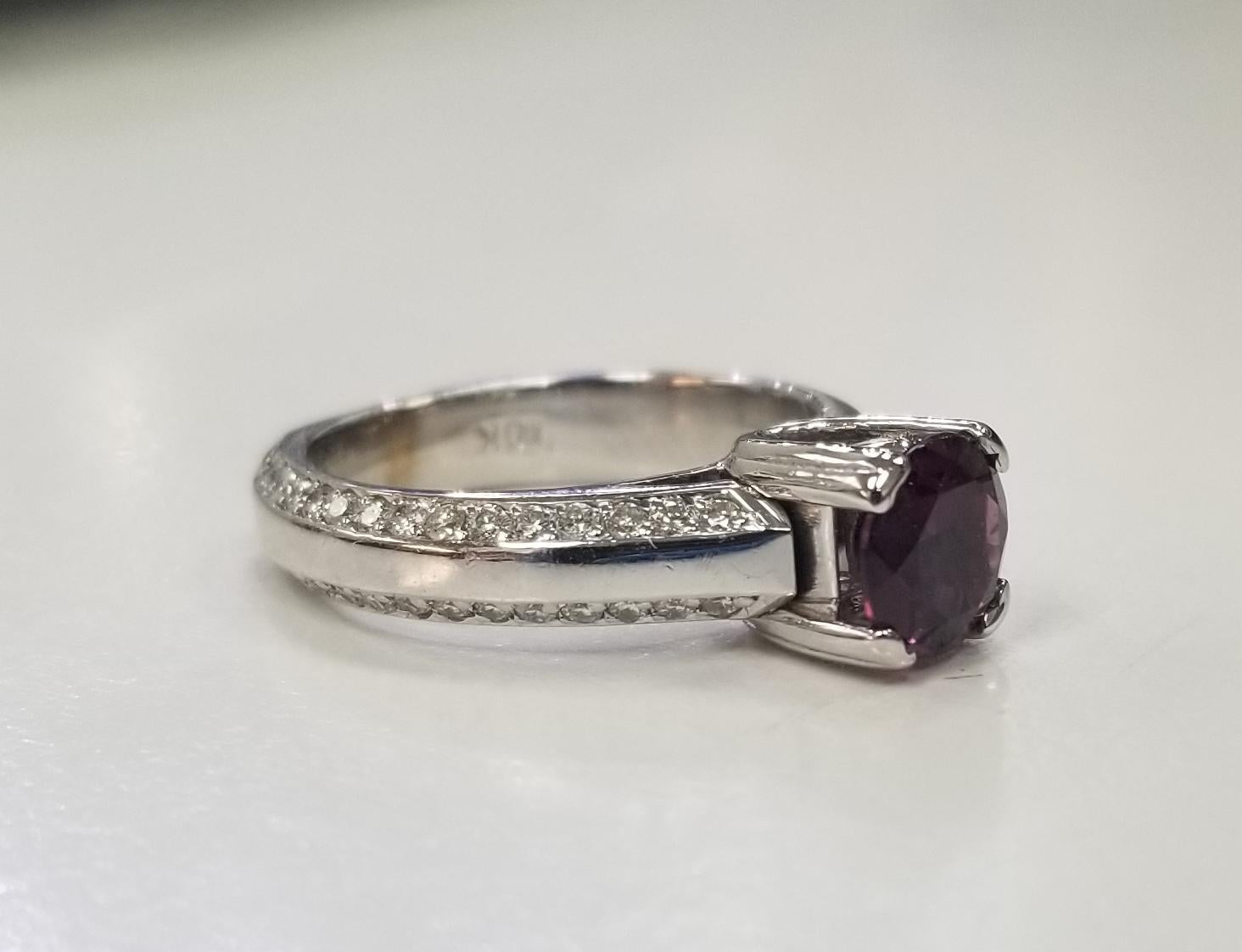 
Specifications:
    main stone:1 Rhodolite Garnet Round 1.43cts.
    DIAMONDS:64PCS
    DIAMONDS carat total weight:APPROX. 0.75 CARAT TOTAL WEIGHT
    color:GH
    clarity:VS2
    metal:18K GOLD
    type: ring
    weight: 7.3 GrS
    size:6.5