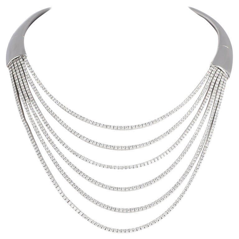 Girocollo rigido in oro bianco 18K con sei fili incastonati di