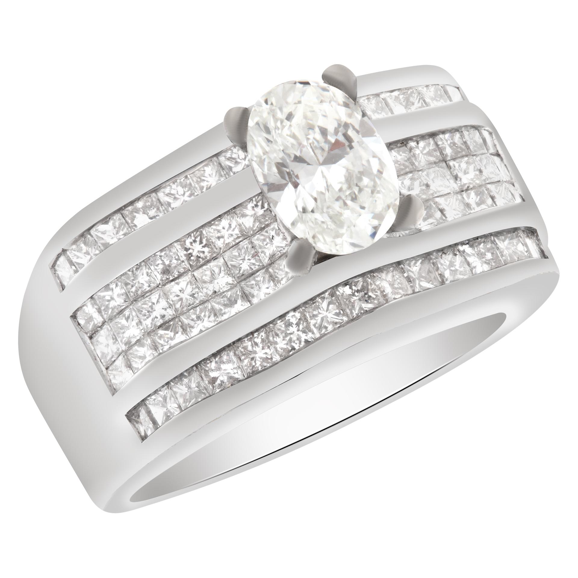 GIA certified oval brilliant cut diamond 1 carat (G color, VS2 clarity) ring set in 18k white gold setting with 1.47 carats in diamonds accents. Size 7This GIA certified ring is currently size 7 and some items can be sized up or down, please ask! It