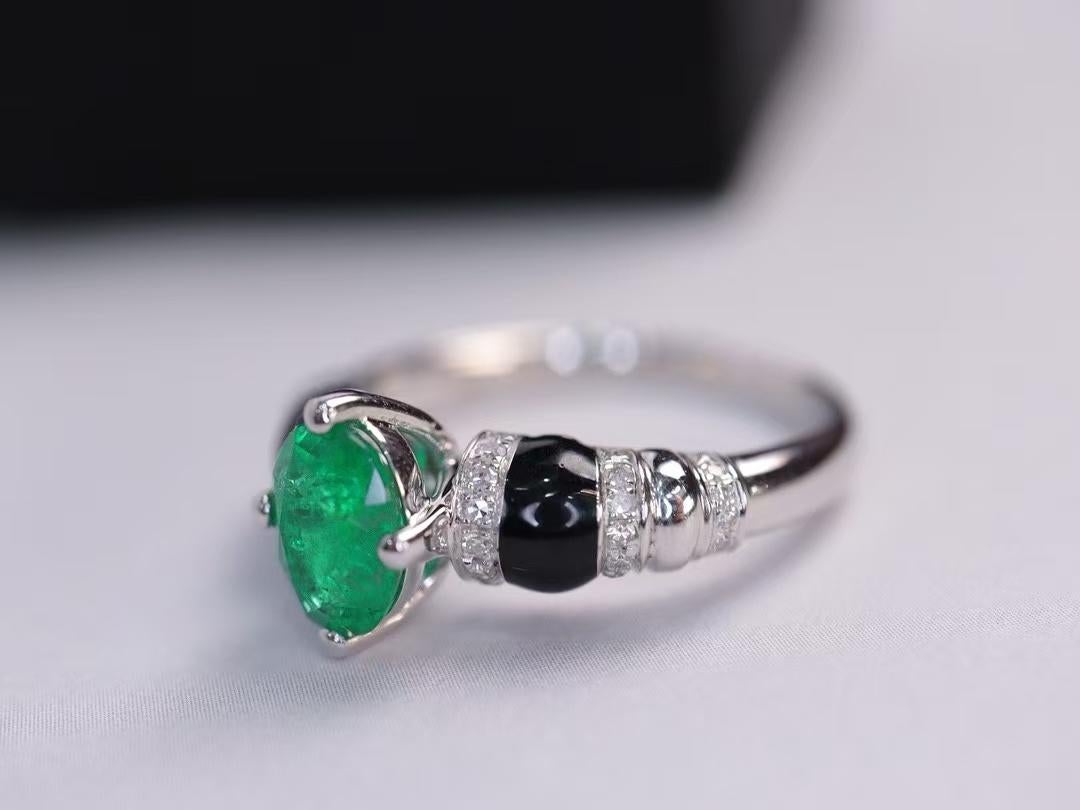 18K White Gold Ring Gorgeous Zambian Emerald Inlaid with Dazzling Diamonds

Main stone - 0.69 CT
Diamonds - 0.17 CT 
Total Weight - 3.11 GM

Distinctive Gemstone: Features a vivid - green Zambian emerald, cut in an oval shape for a classic