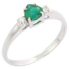 Emerald and Diamond Three Stone Engagement Ring in 18K White Gold 